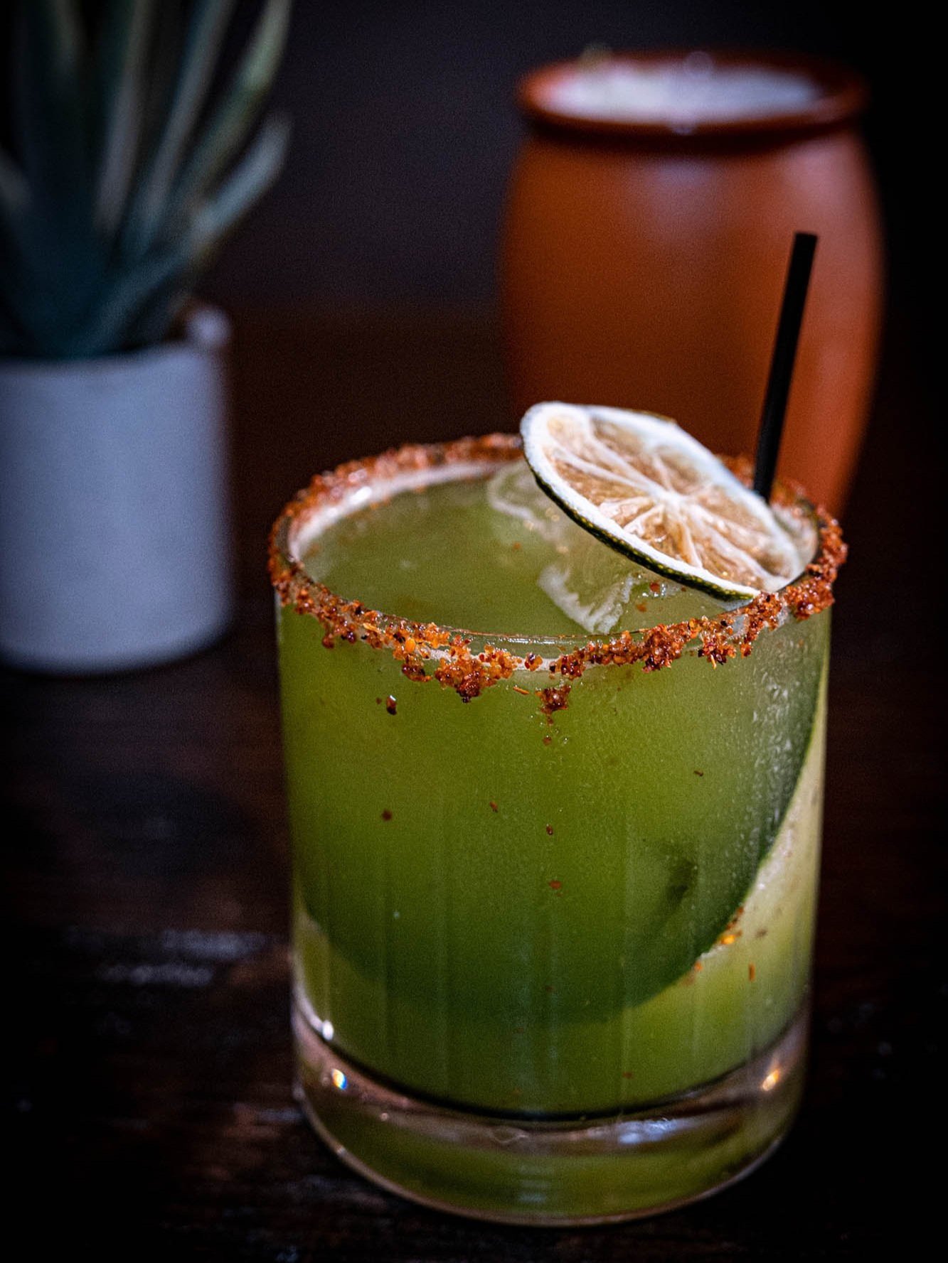 product image of green cocktail with tajin rim taken by Sharma Shari Photography