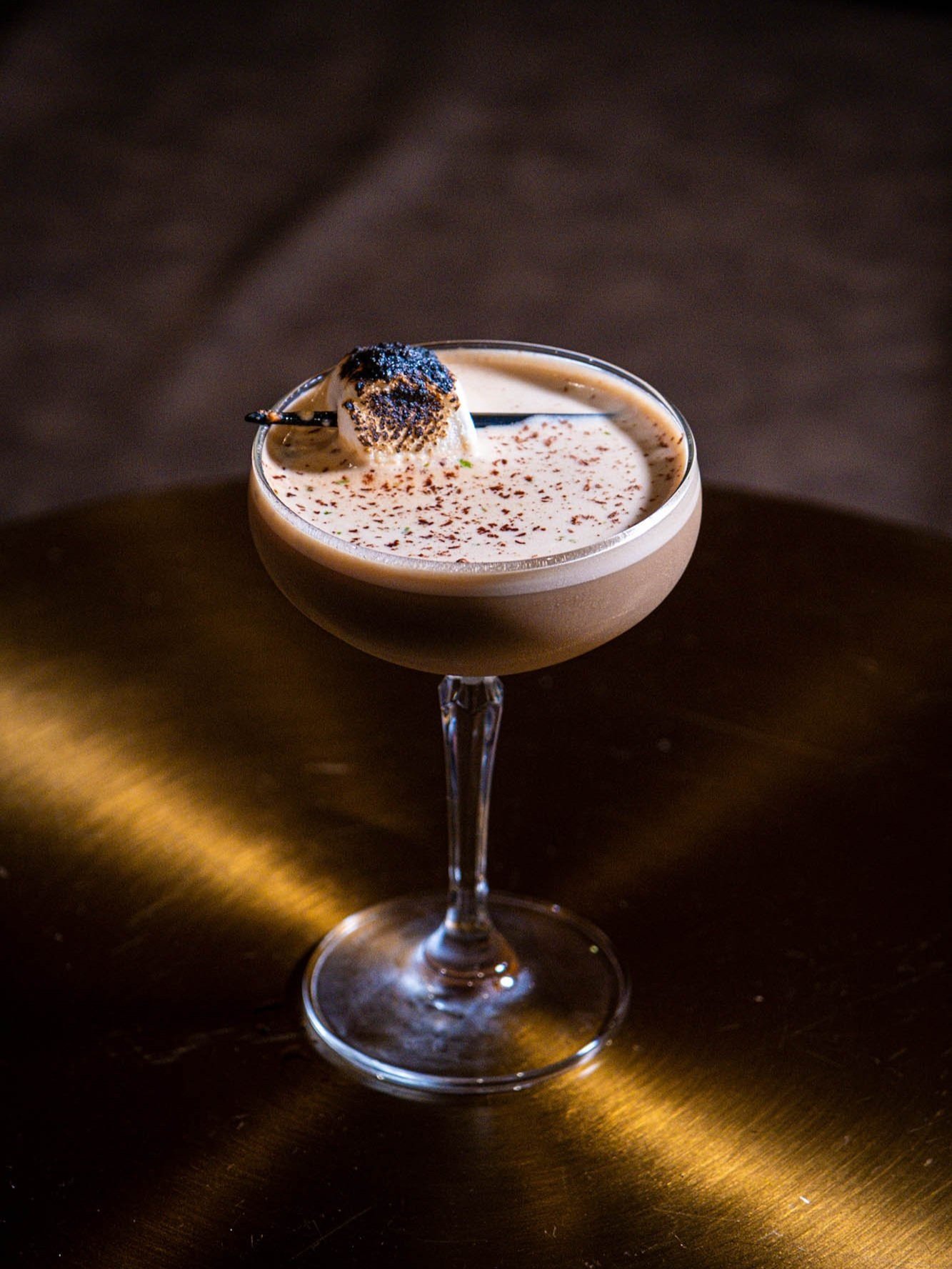 upclose product photo of smore cocktail topped with charred marshmallow taken by Sharma Shari Photography