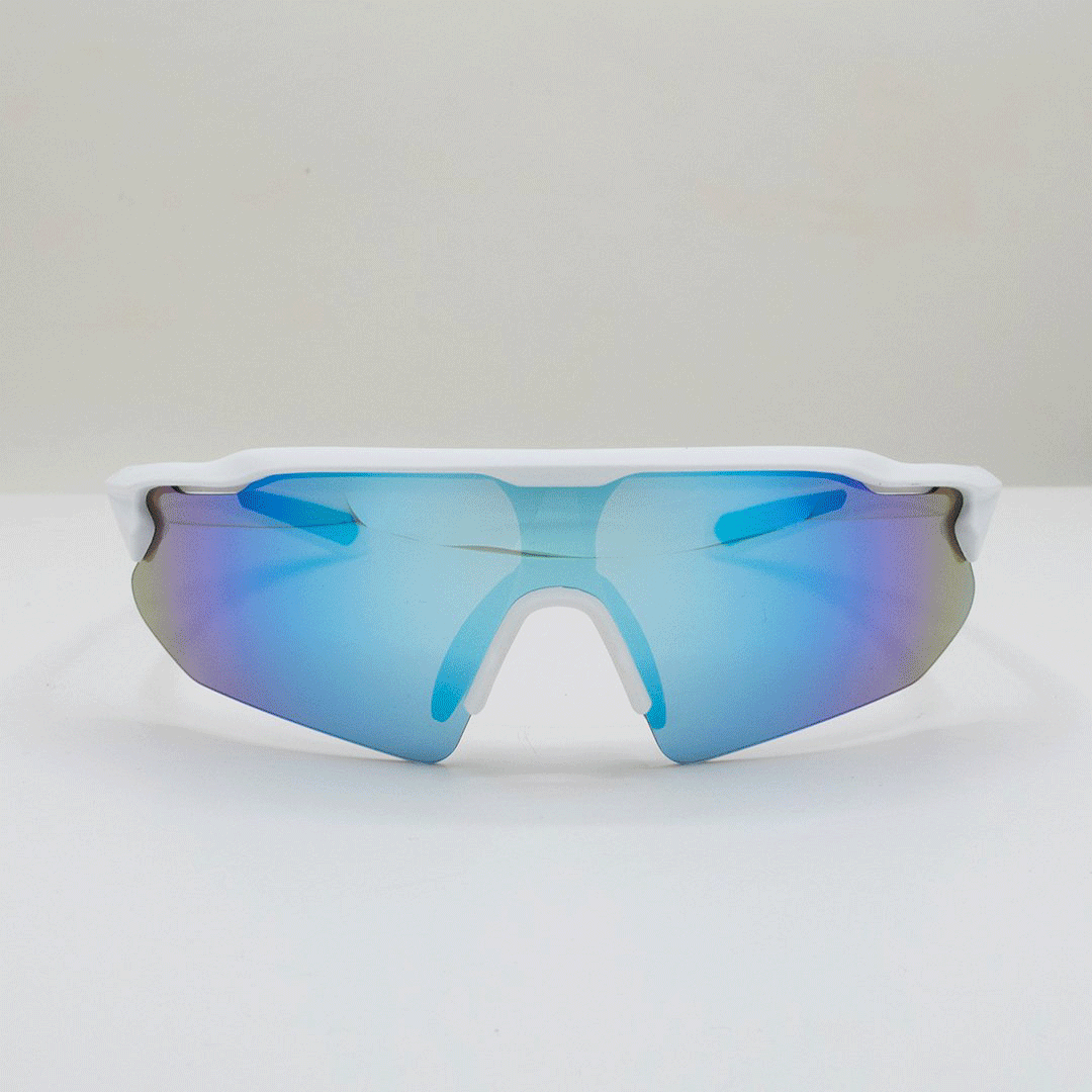 A pair of sports sunglasses with a reflective blue lens and white frame on a white surface.