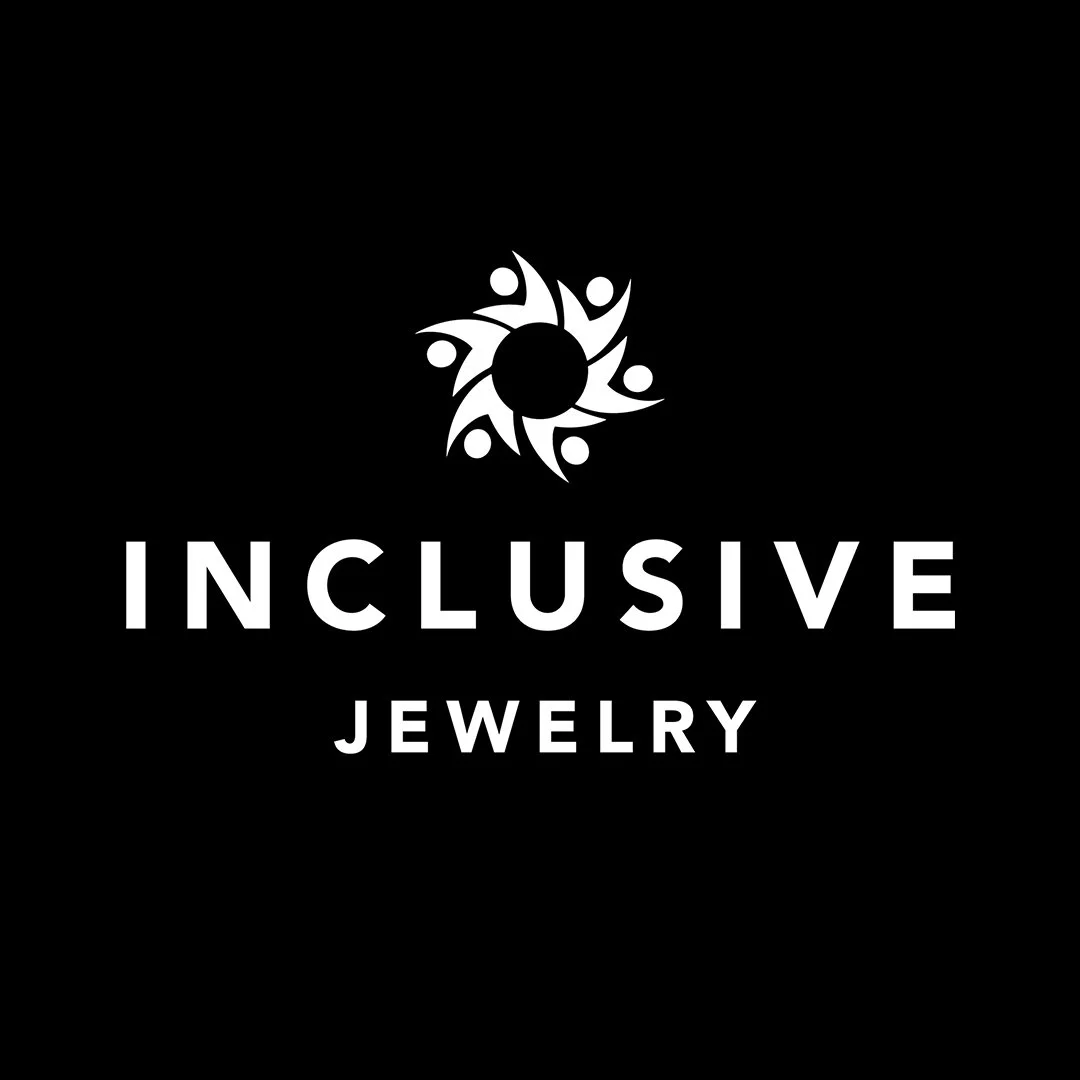 Logo for Inclusive Jewelry featuring a circular design with stylized human figures surrounding a central circle, on a black background with the words 'INCLUSIVE JEWELRY' in white.