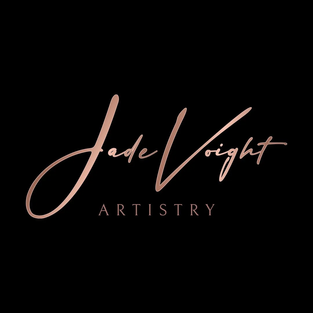 Black background with rose gold cursive text that says "Jade Voight" and smaller capitalized text below that says "ARTISTRY."