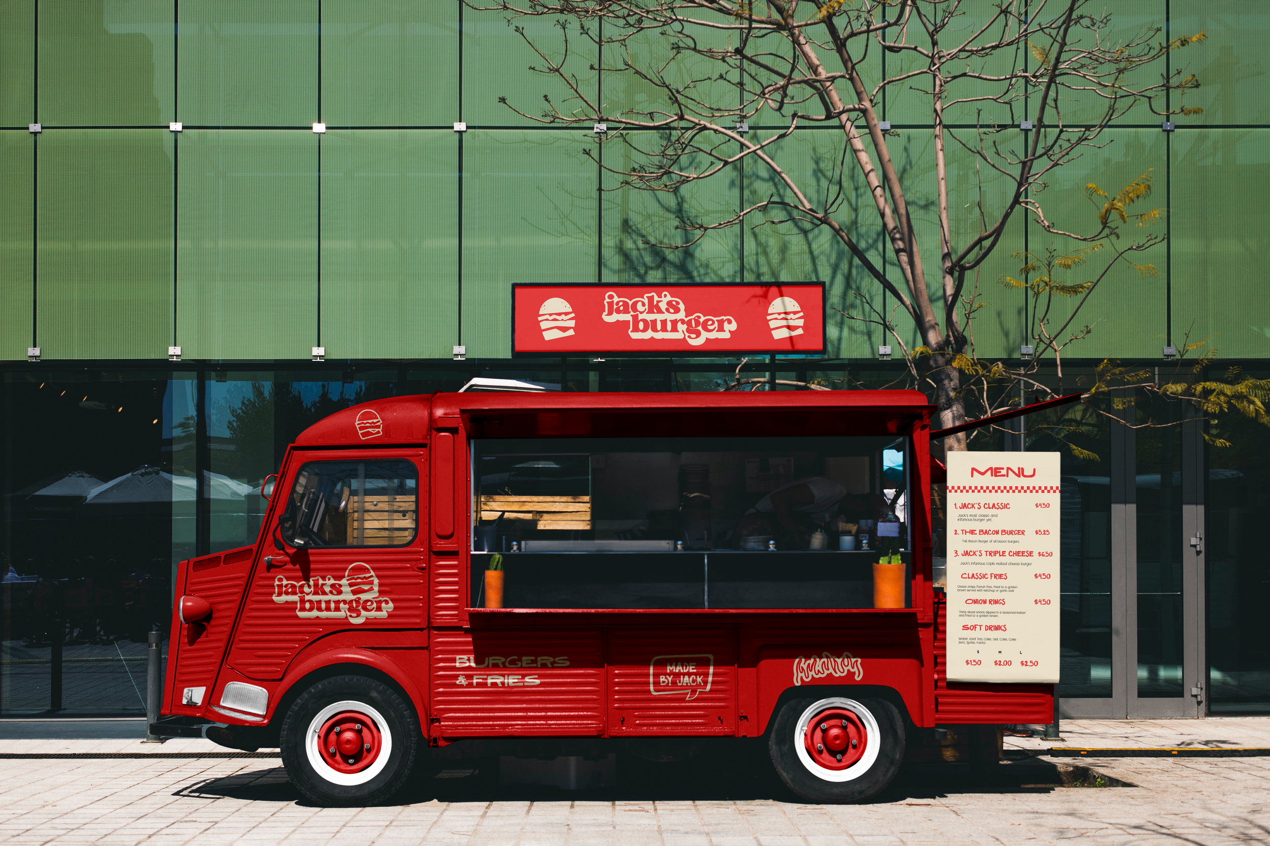 Red vintage food truck with 'Jack's Burger' branding, parked in front of a modern green glass building, displaying a menu board offering various burgers and fries.