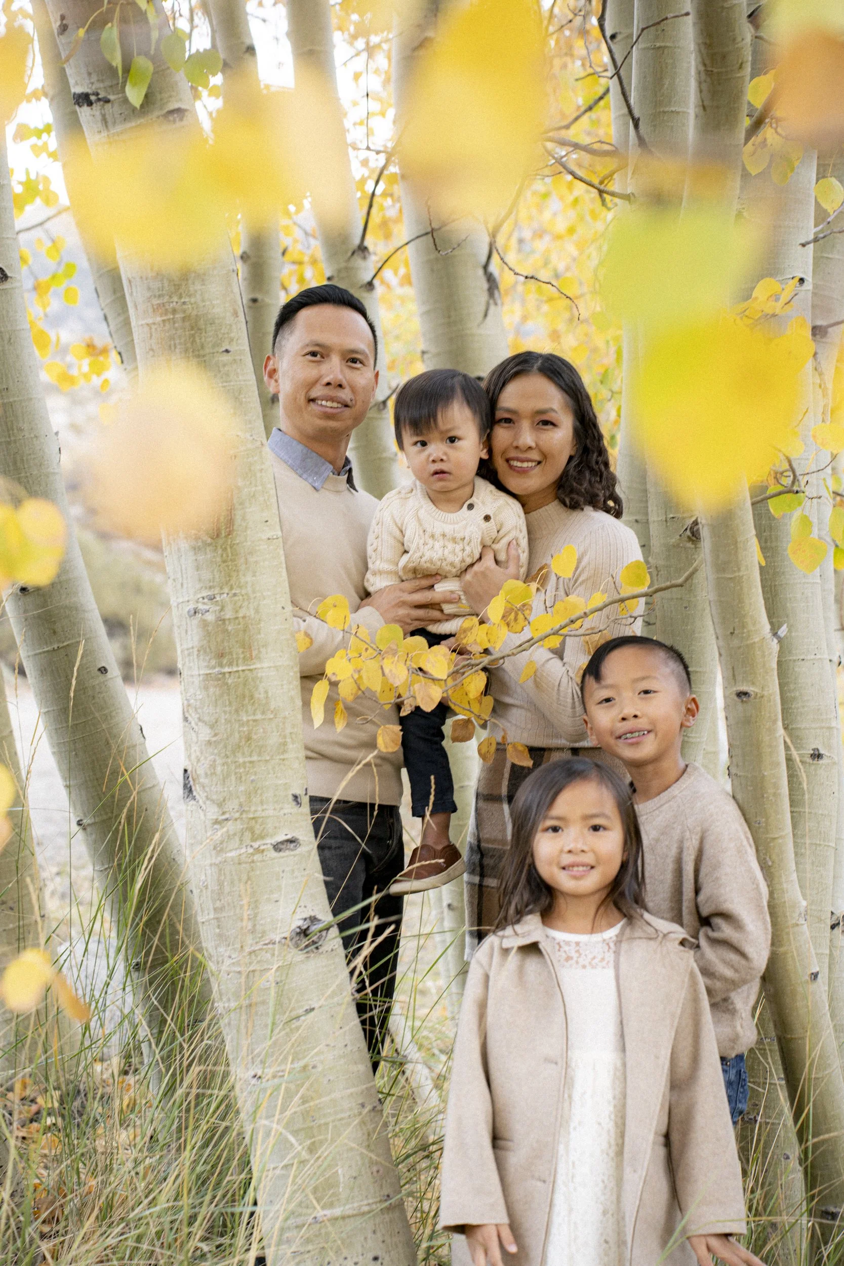 A family in front of Yosemite Falls 