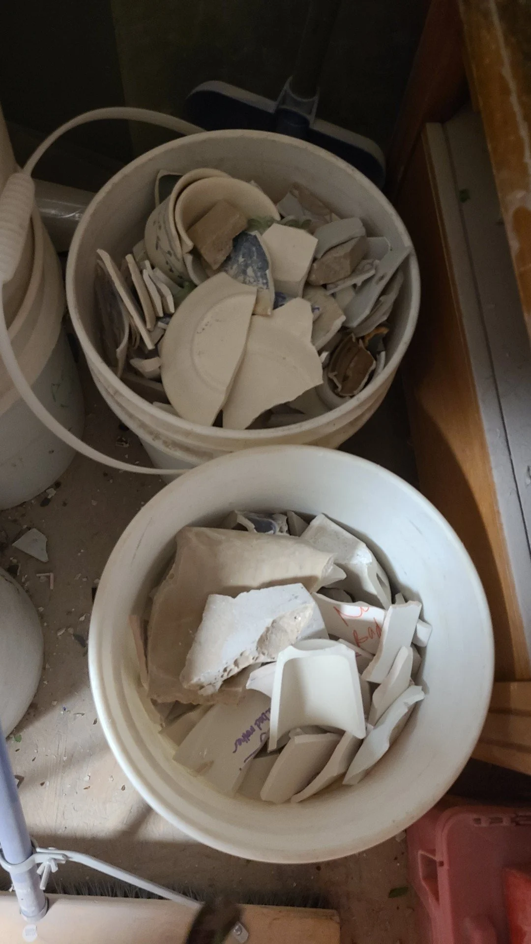 broken ceramic in buckets.jpg