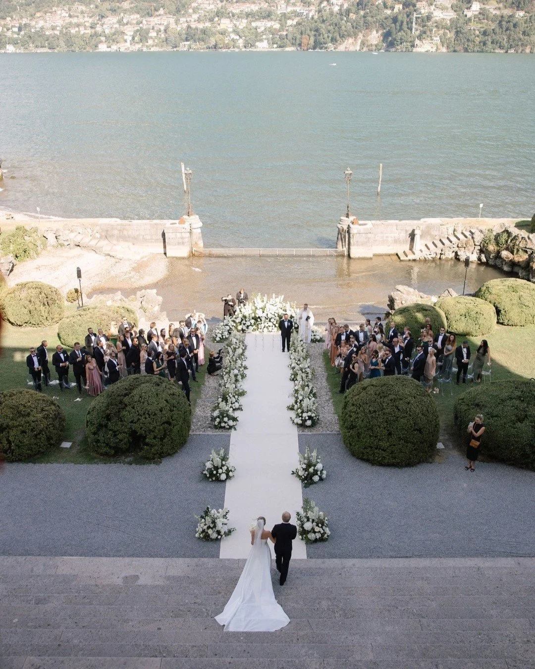 J&amp;T's luxury Lake Como destination wedding at Villa Erba. This multi-day wedding celebration in Italy featured a breathtaking lakeside ceremony directly at the water creating a romantic, unforgettable moment for everyone around. 

Planning: @ido_