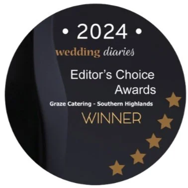 Round 2024 Wedding Diaries Editor's Choice Awards logo with "Graze Catering - Southern Highlands" as the winner. Features gold stars on a black background.