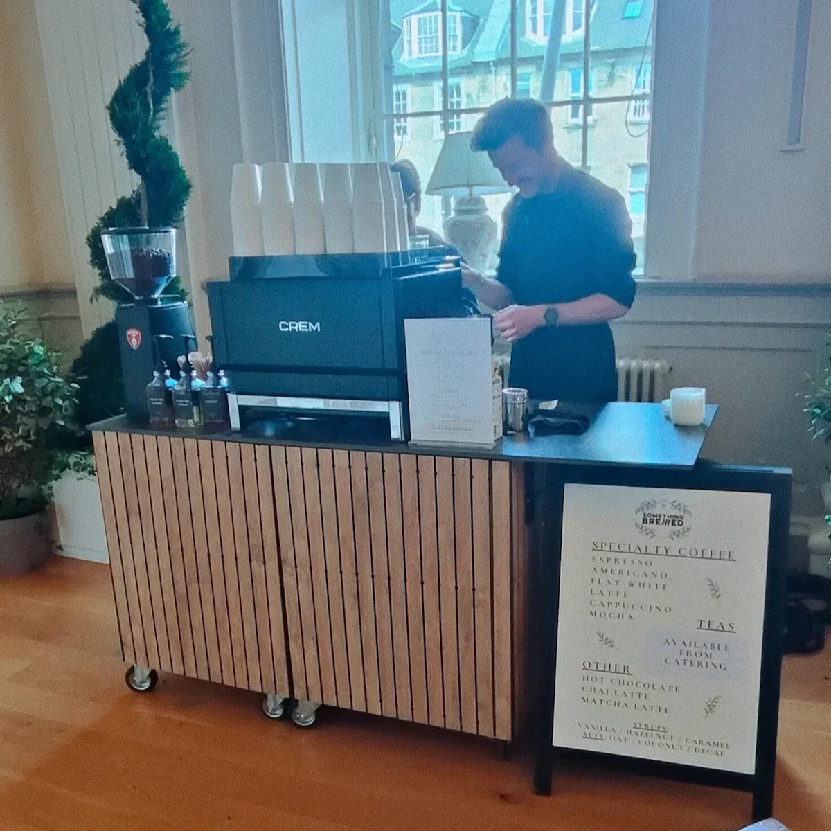 Mobile coffee bar setup serving specialty coffee at a corporate or private event in Scotland.