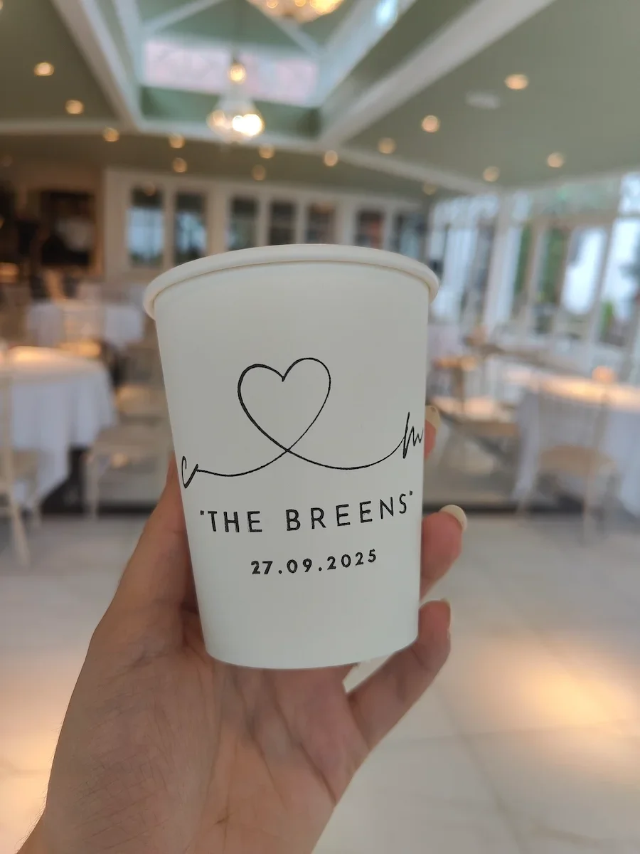 Custom coffee cups with personalised logo for event coffee bar