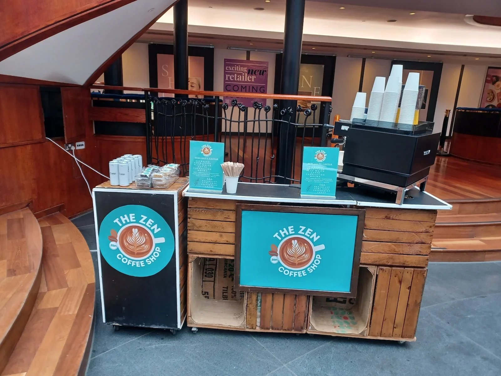 Brand activation coffee bar hire at a busy exhibition stand serving fresh coffee