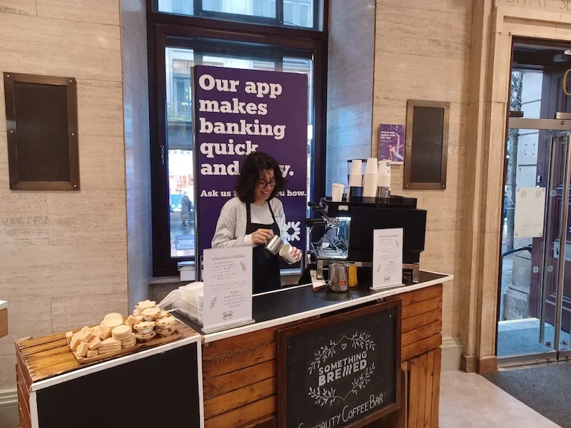 Barista hire providing espresso drinks at business conference