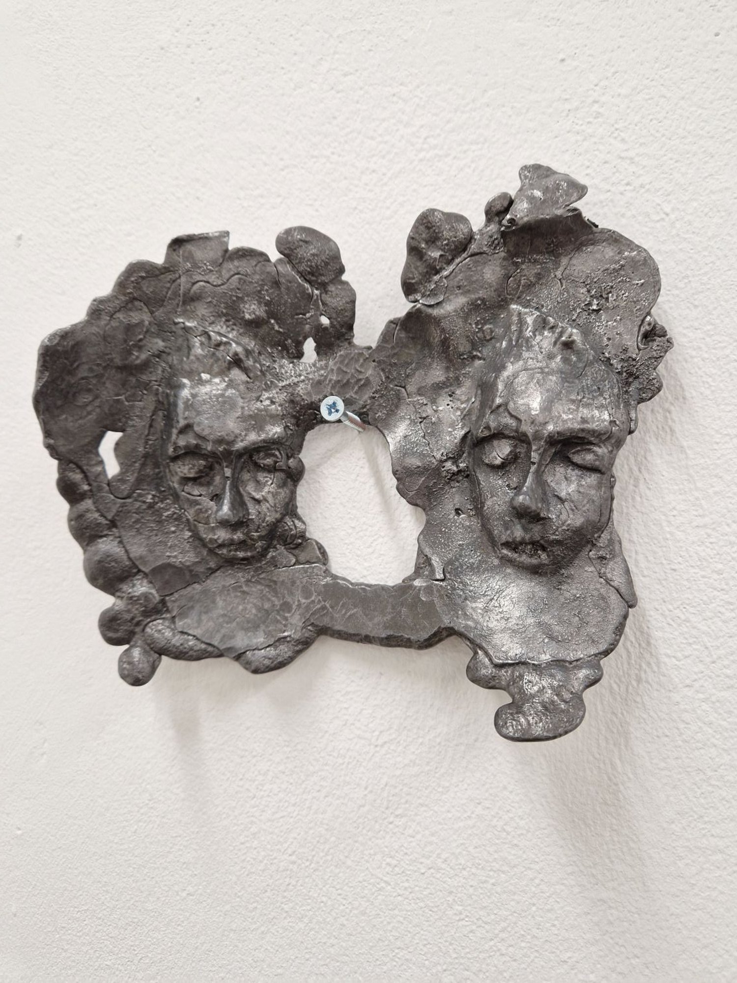 Two, 2024. Sealed lead - 19 x 20 x 2.5 cm