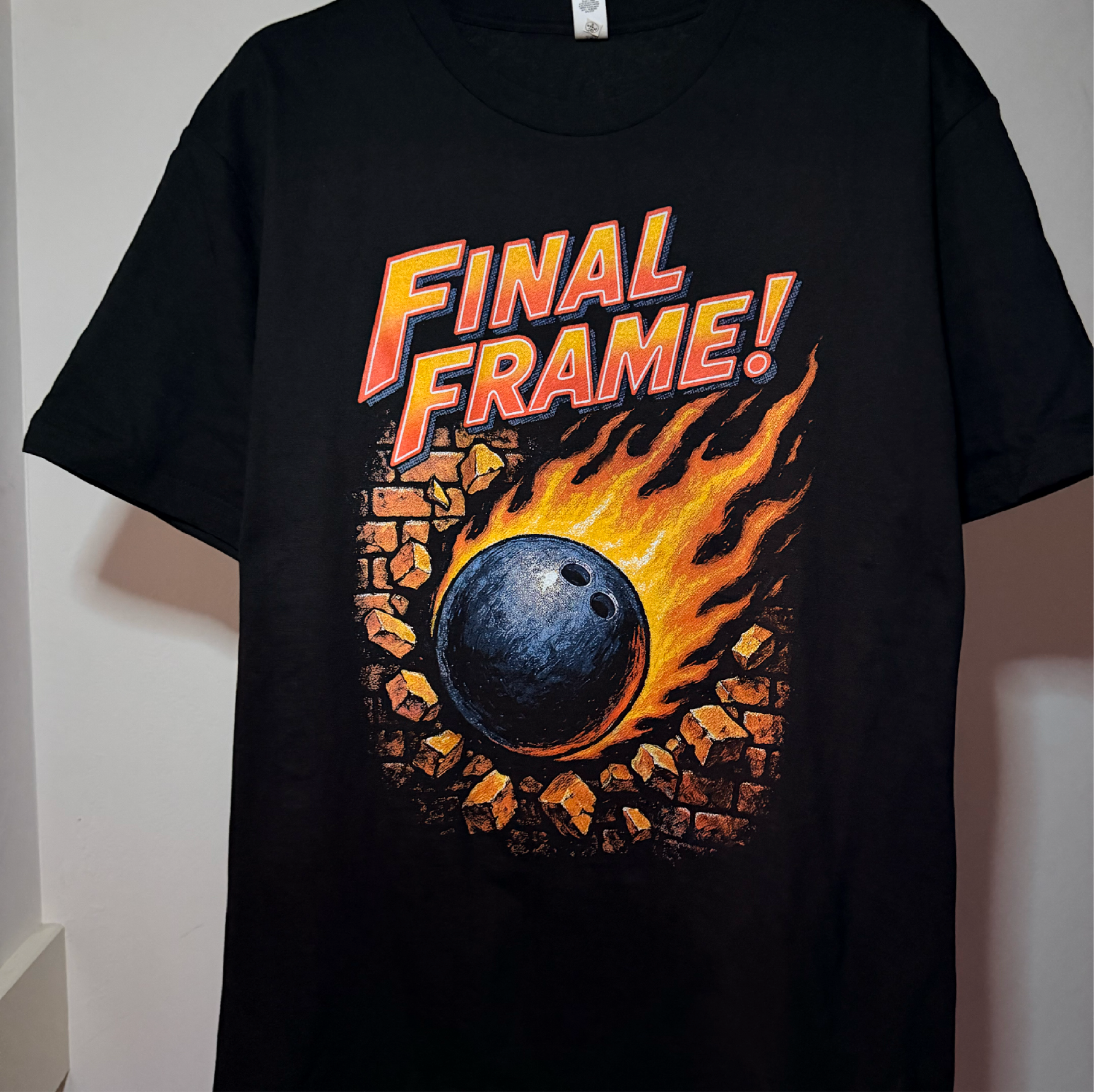Flaming bowling ball retro tee