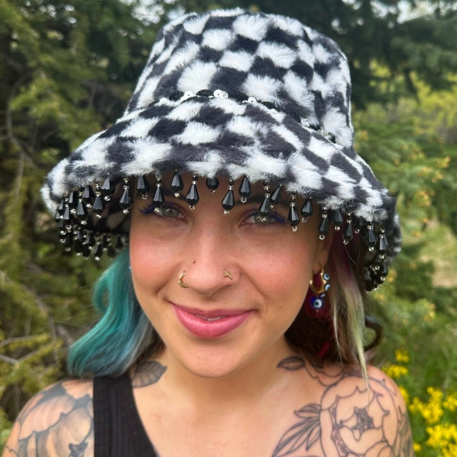 checkerboard fuzzy bucket hat