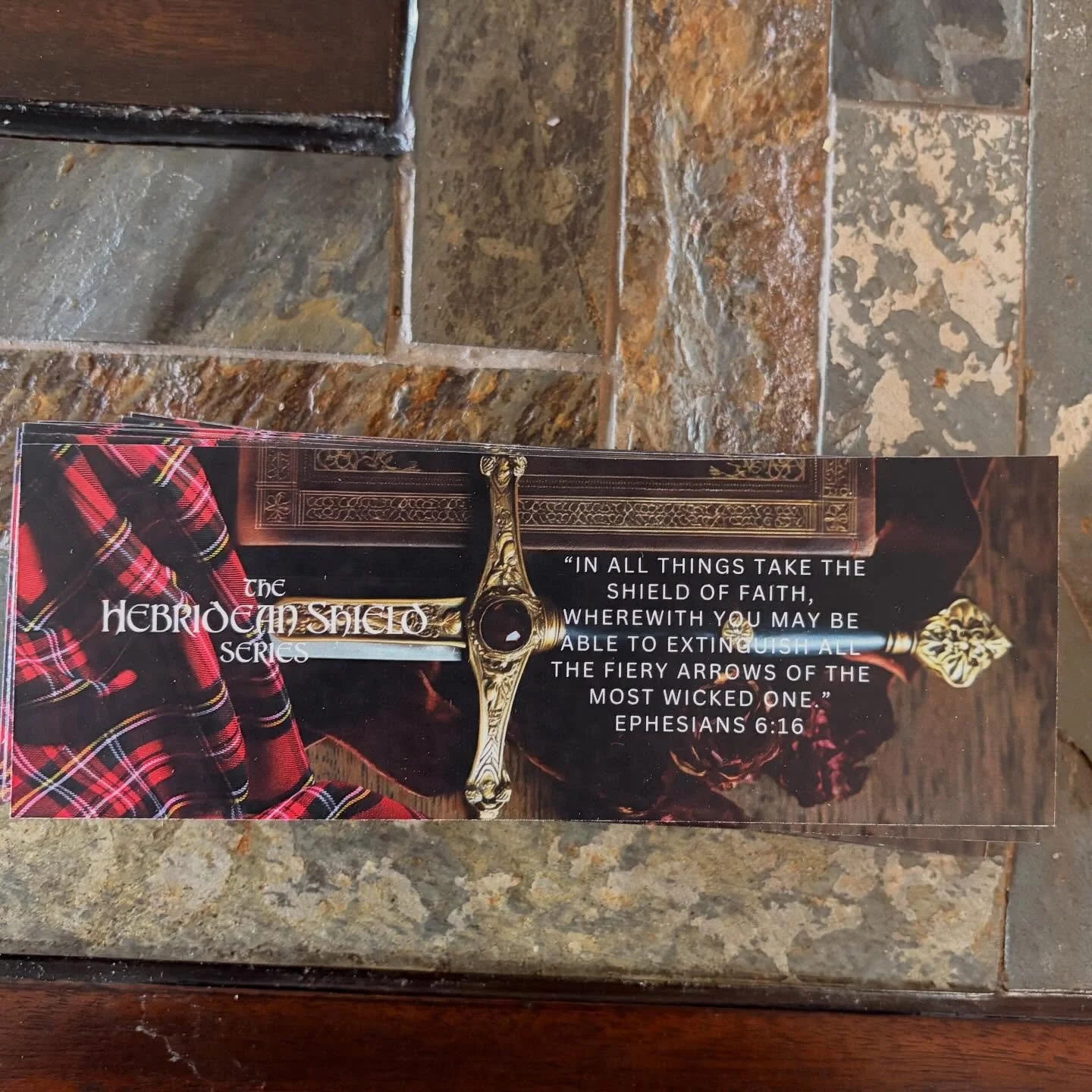 Freebie call! 🗣️Loving my new bookmark featuring Hector&rsquo;s sword, a psalter, Lachlan&rsquo;s tartan, and the series verse. The symbols are so important for the rest of the series&hellip; can&rsquo;t wait to reveal more in the next book. In the 