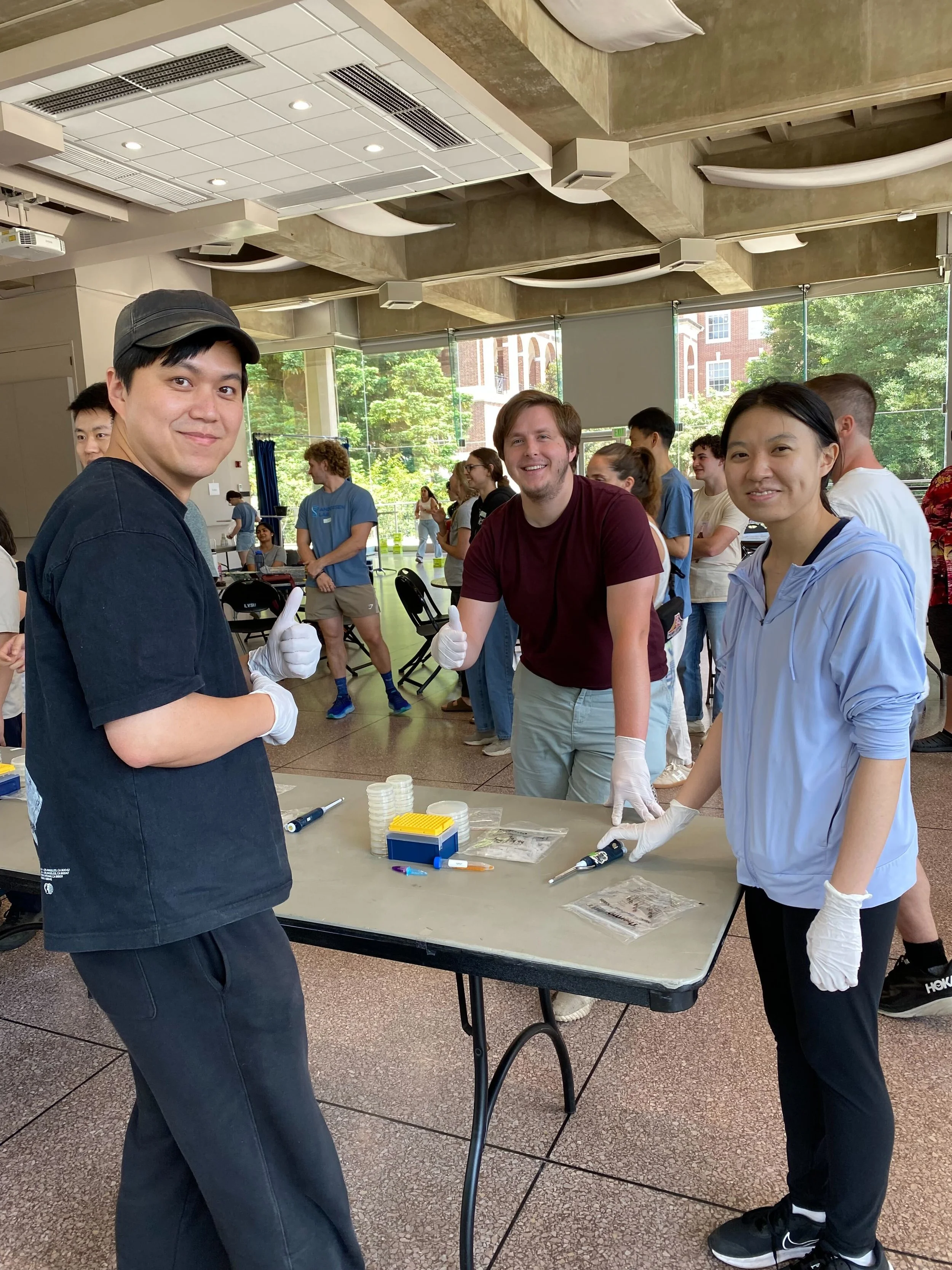 August 2025: Kim lab members Youngyong Park, Danny Lenchner, and Julia Zhou prepare to compete in feats of science during the first annual JHU Wormlympics!
