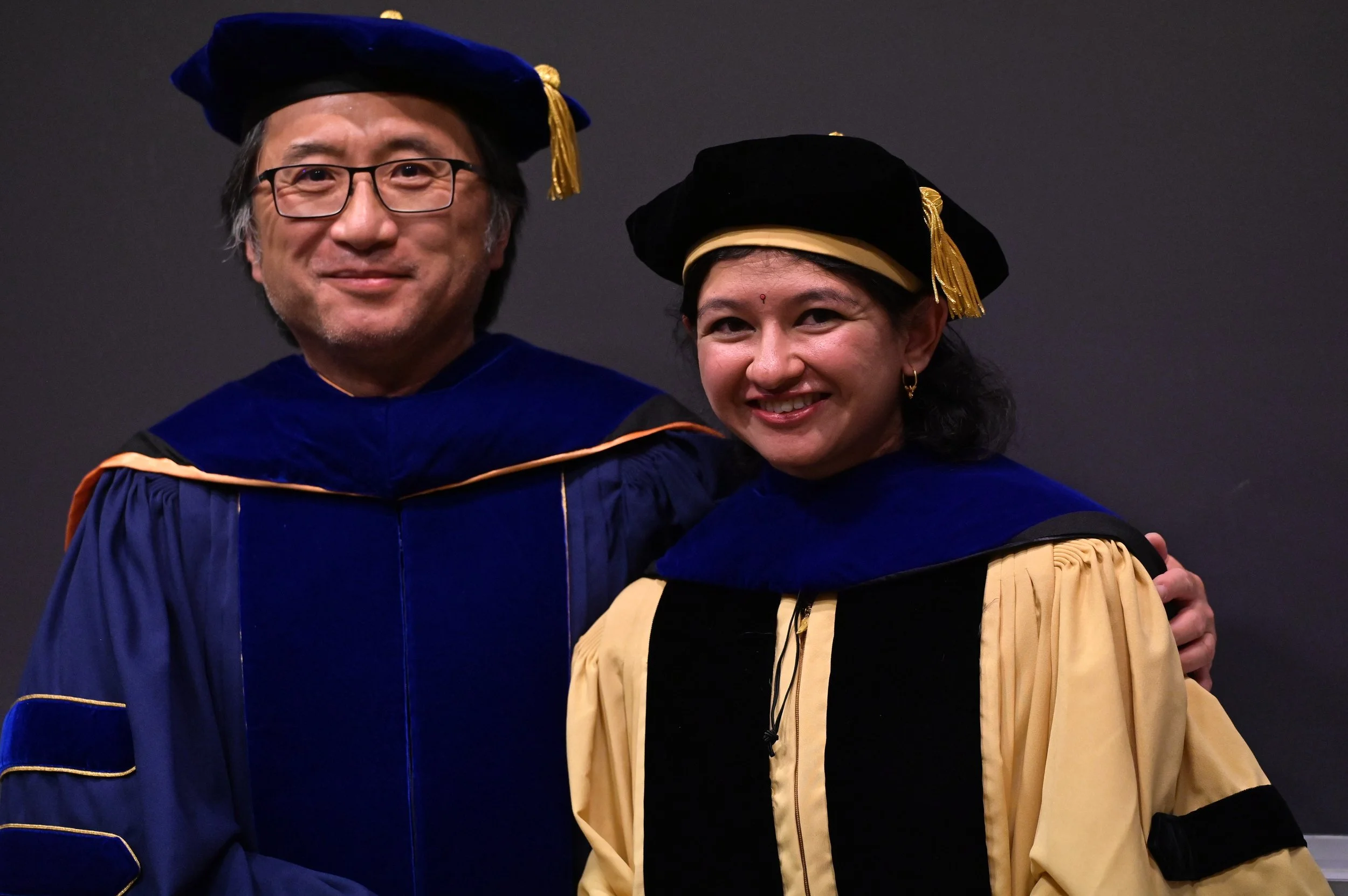 May 2023: Dr. John Kim hoods Kim Lab graduate Himani Galagali at JHU CMDB's Hooding Ceremony. Congrats Dr. Galagali! 