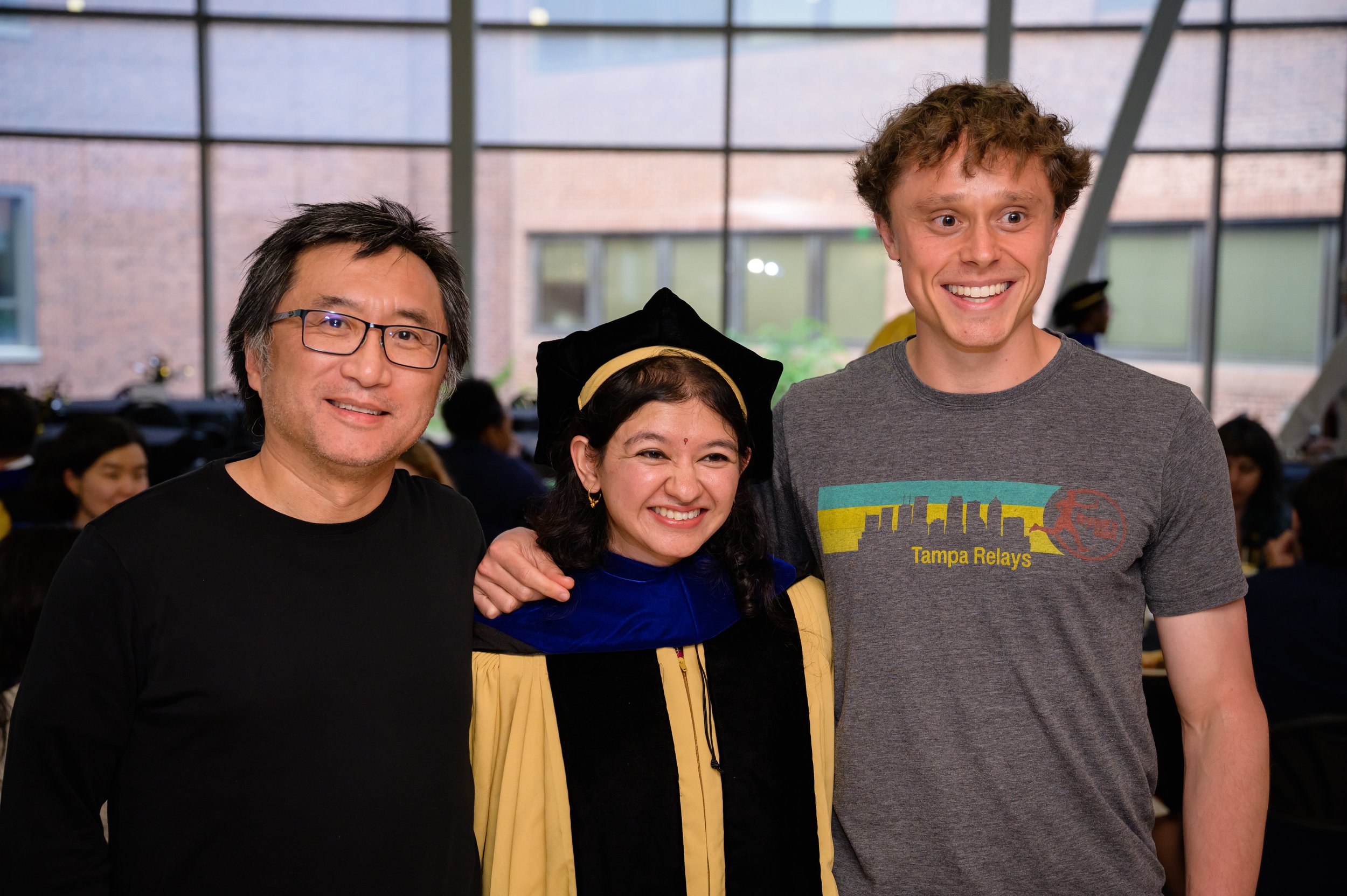 May 2023: Dr. John Kim (left) and Kim Lab graduate student Lars Benner (right) celebrate Kim Lab graduate Himani Galagali at JHU CMDB's Hooding Ceremony. Congrats Dr. Galagali! 