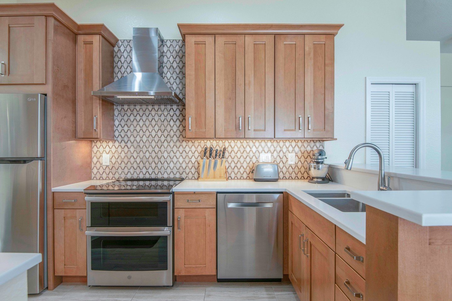 We love a before &amp; after glow-up! ✨ This kitchen craved a brighter, more open feel, and we achieved it without knocking down walls.  Smart storage solutions did the trick, making this space truly shine! Ready to revamp your kitchen? We can help!
