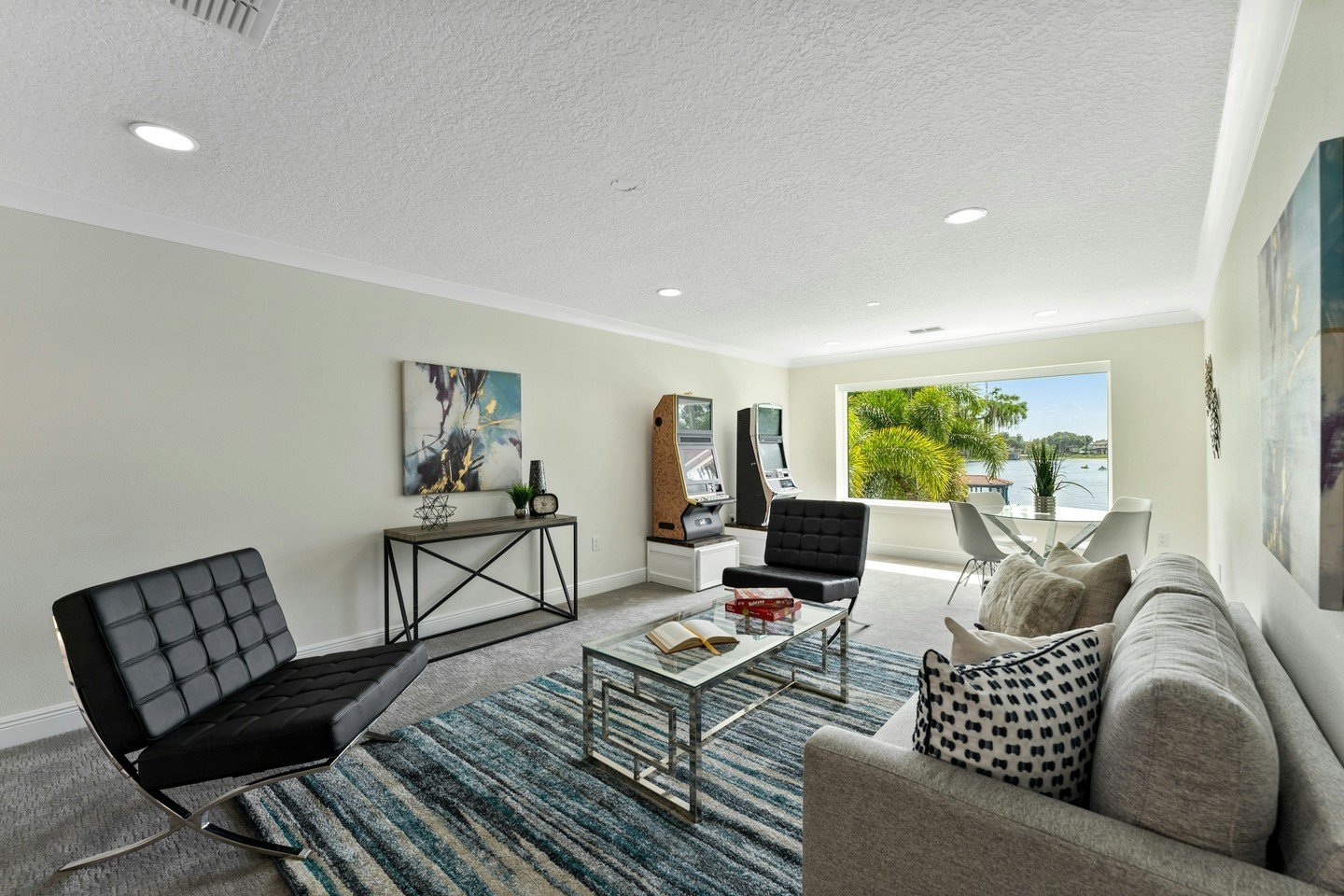 This hangout room is the perfect escape, offering breathtaking views and a space to unwind with friends or a good book. Let us design your dream retreat! 😊 

 #FloridaViews #TheHomestylesGroup #HangoutGoals #InteriorDesign