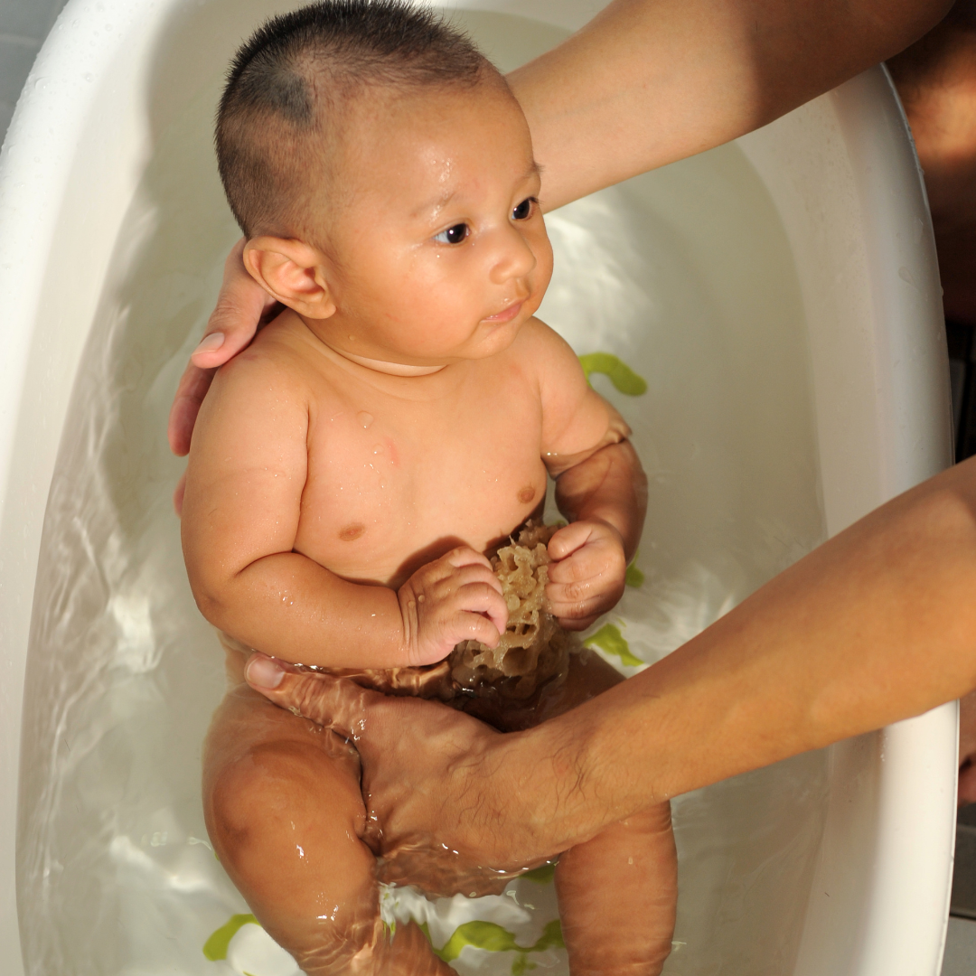A baby in a bath