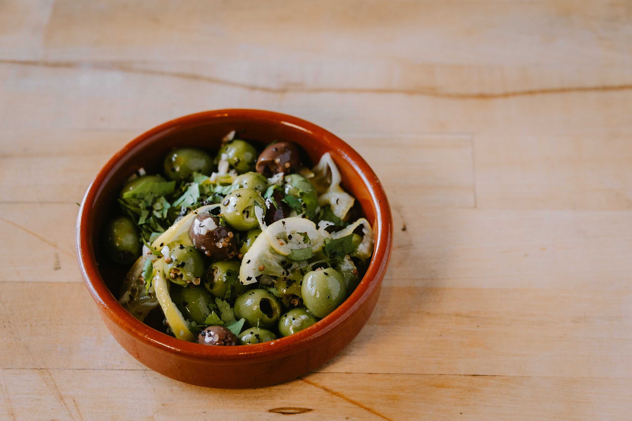 Marinated Olives + Lemon, Coriander, Urfa Biber