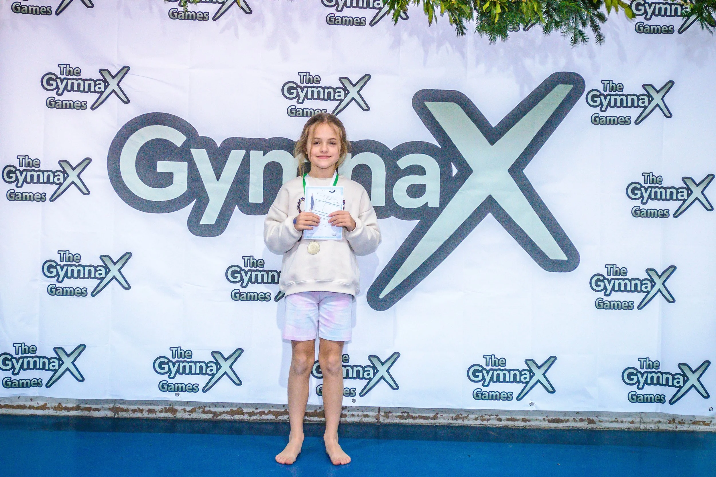 Children competing in GymnaX Games gymnastics event at Cumnor House Sussex