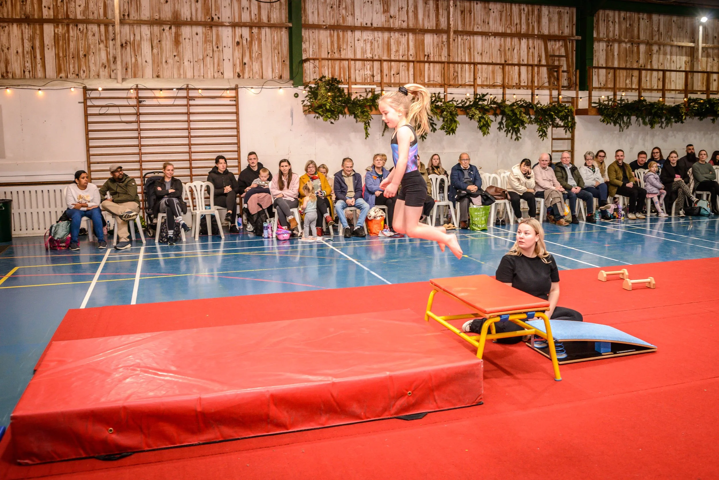 Children competing in GymnaX Games gymnastics event at Cumnor House Sussex