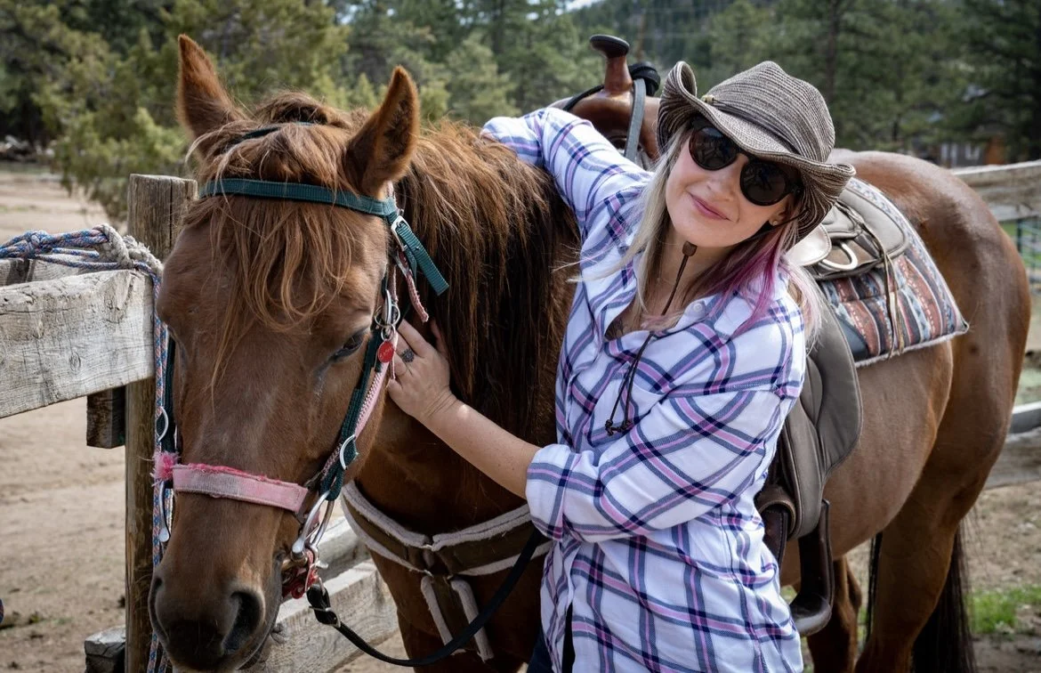 Shannon hanging with a beautiful horse named Sasha during a Yoga Retreat.