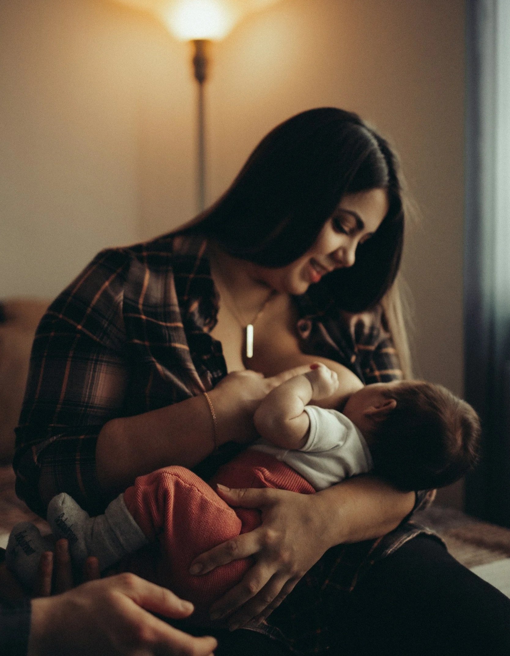 IBCLC providing in-home lactation support for mother and baby in Greenville SC