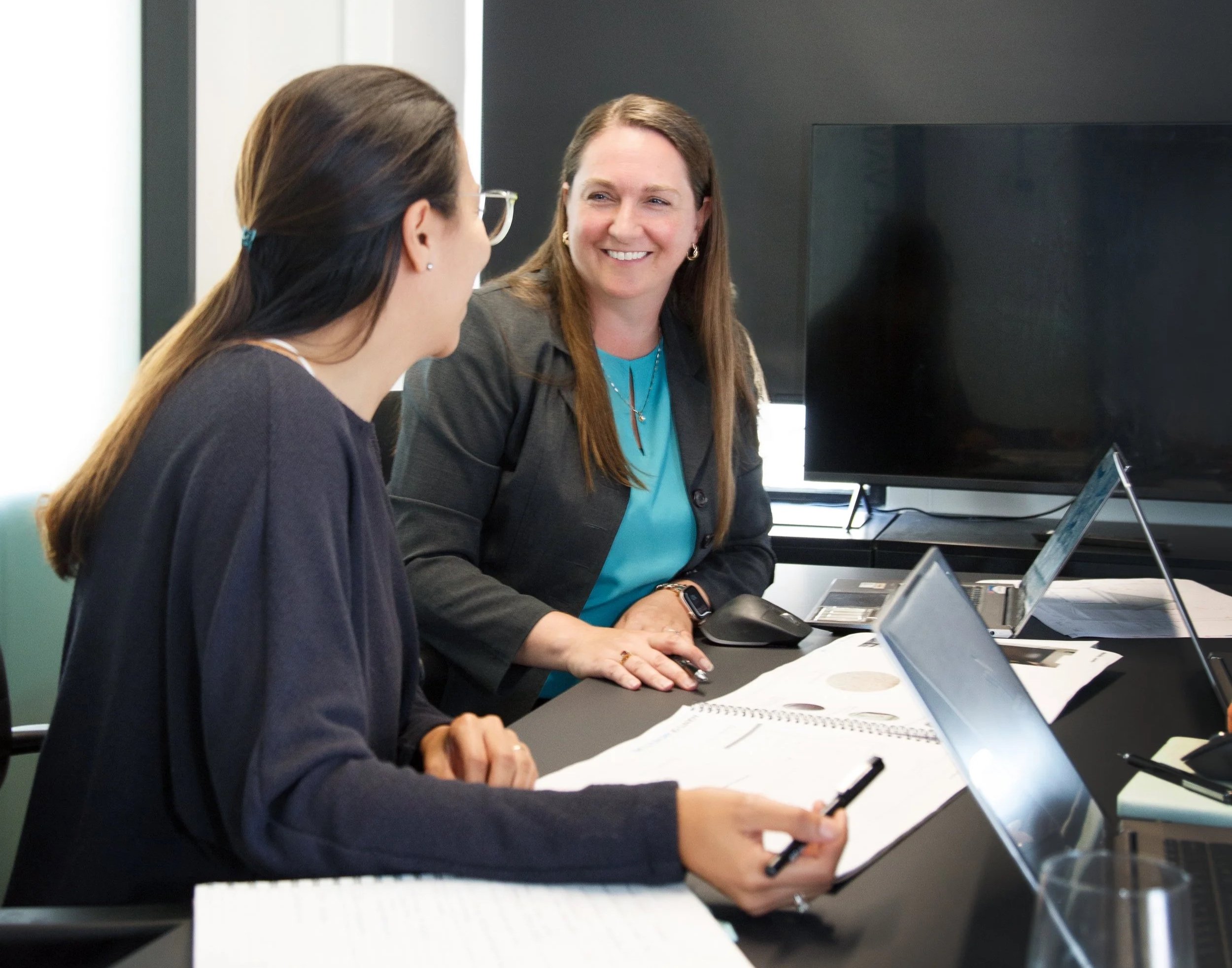 Architect and client discussing design decisions together during the architectural process.