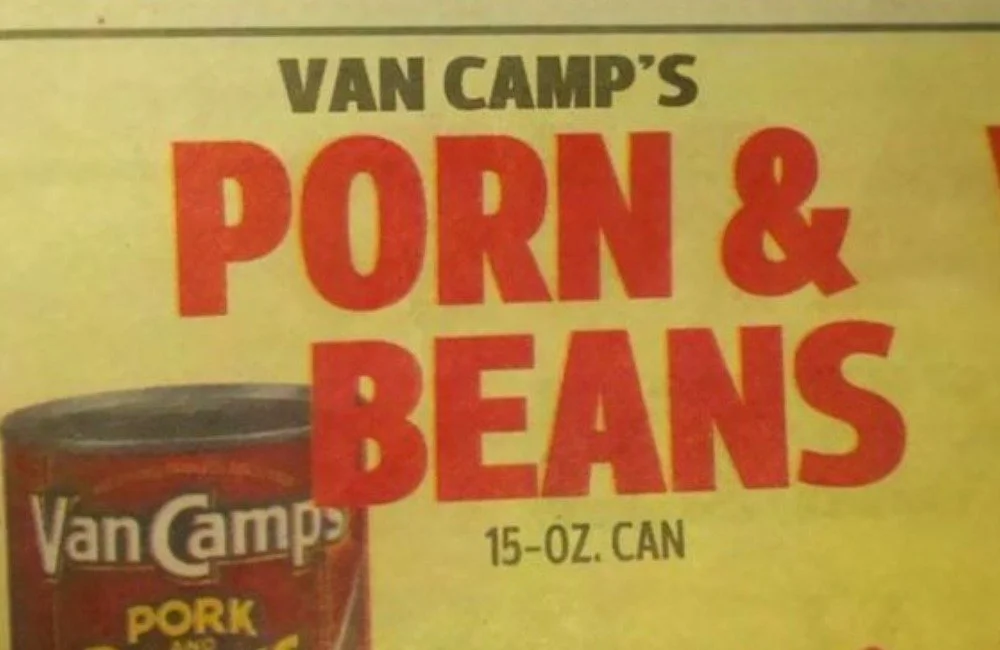 Close-up of a vintage food product label for Van Camp's Pork and Beans, featuring bold red and black text on a yellow background.