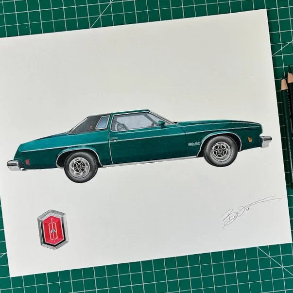 Drawing of a vintage green car with a black roof, accompanied by a red emblem and artist's signature on white paper.