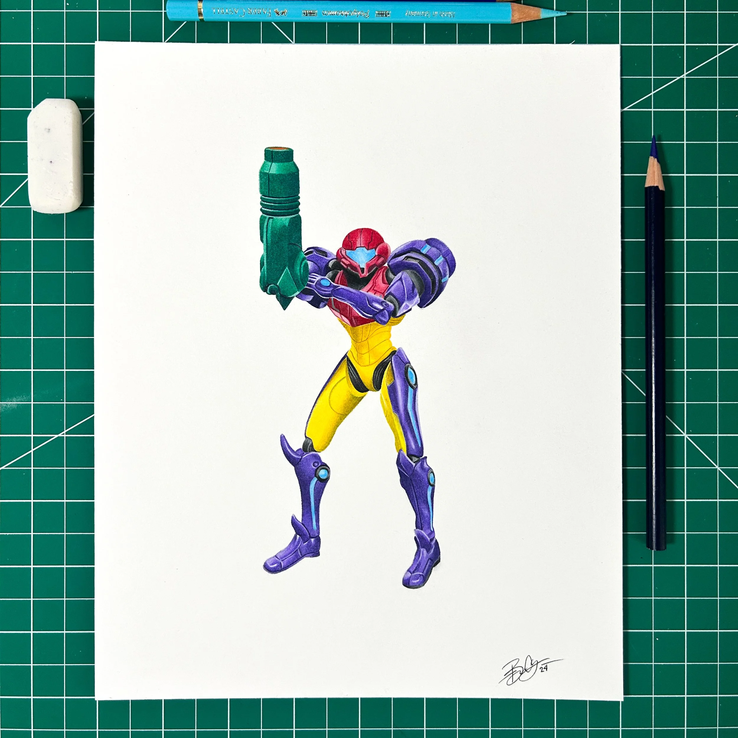 Colorful illustration of a futuristic female superhero in a purple, yellow, and red suit, with her arm raised and clenched fist inside a workspace with green cutting mat, blue pencil, black pen, eraser, and white paper.