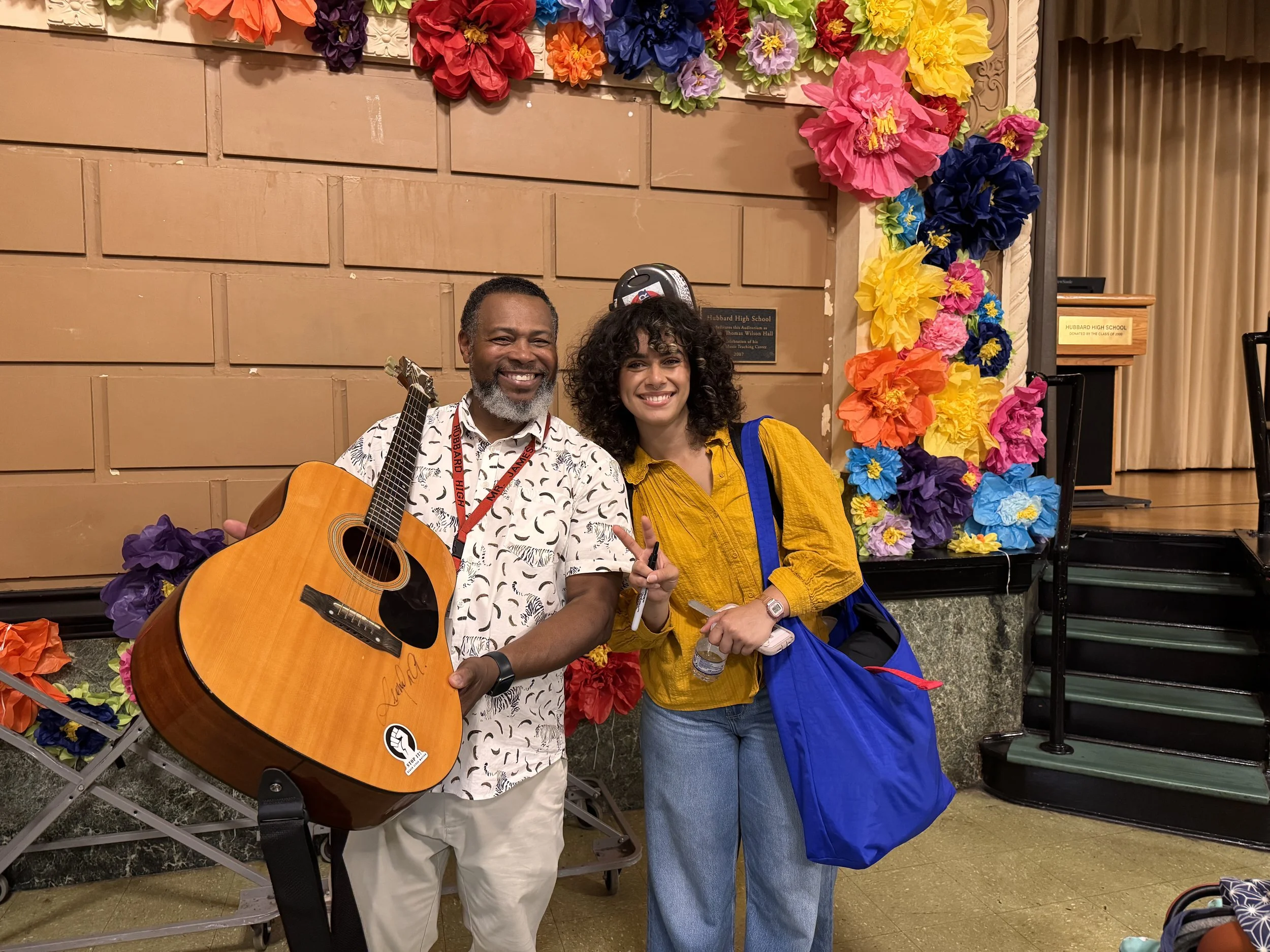 Leonela Alejandro and Mr. James Alvin pose for a photo during her visit.