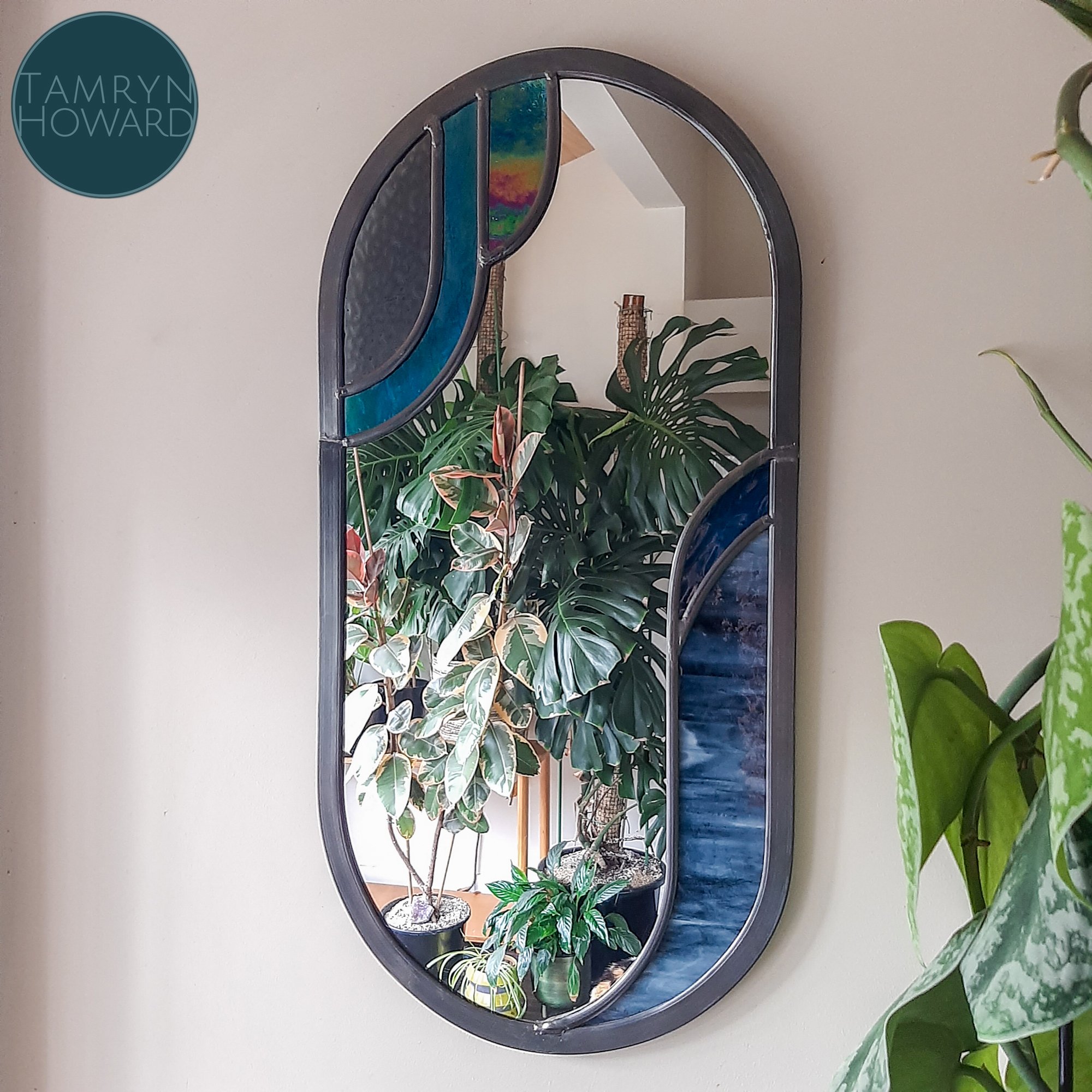 I recently made a larger version of my &quot;Arch Deco&quot; mirror in some custom colours. The original design is a small mirror at 305mm x 150mm, but this one is double the size! 

#tamrynhoward #stainedglass #stainedglassnz  #leadlight #leadlightn