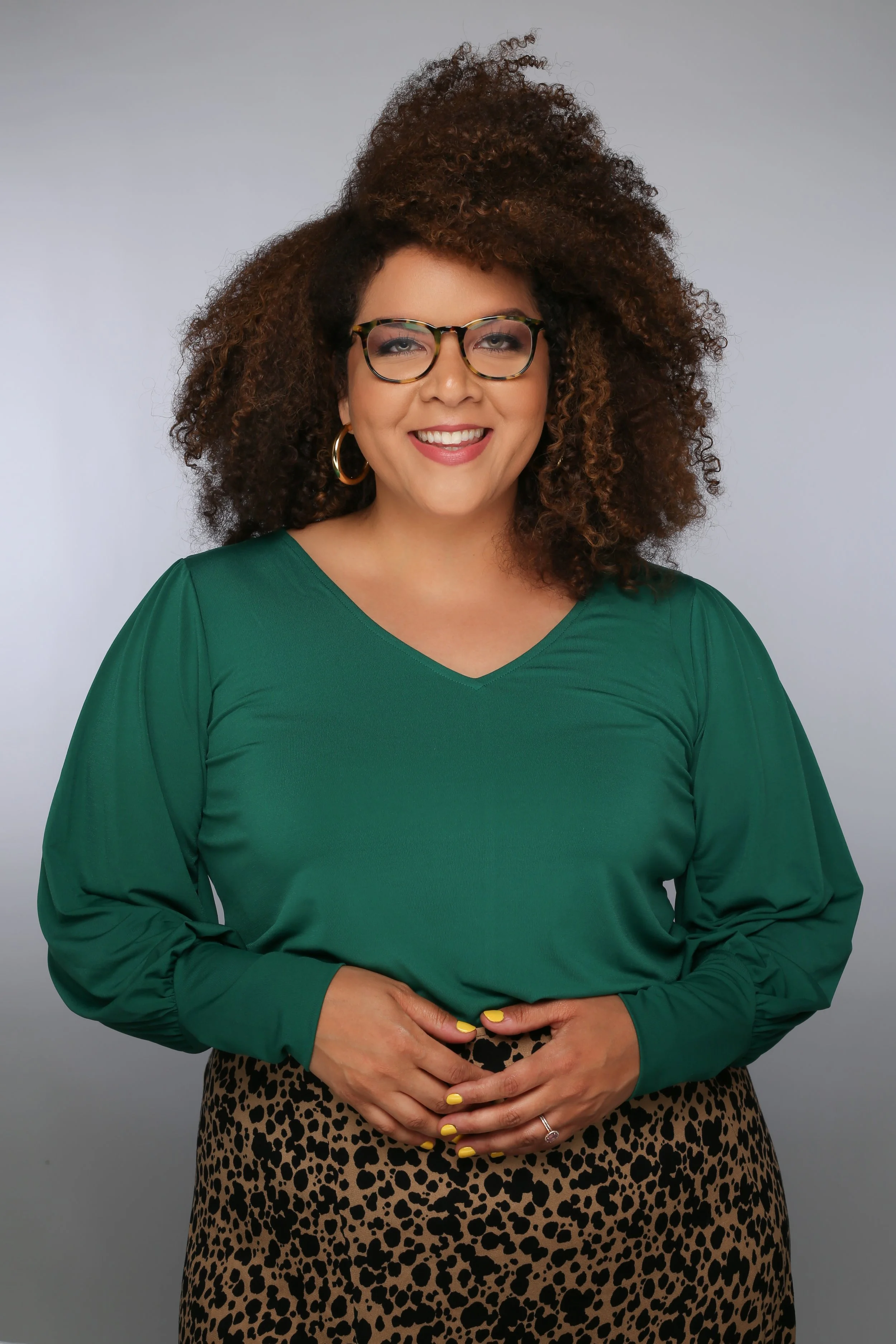 green shirt headshot.jpeg