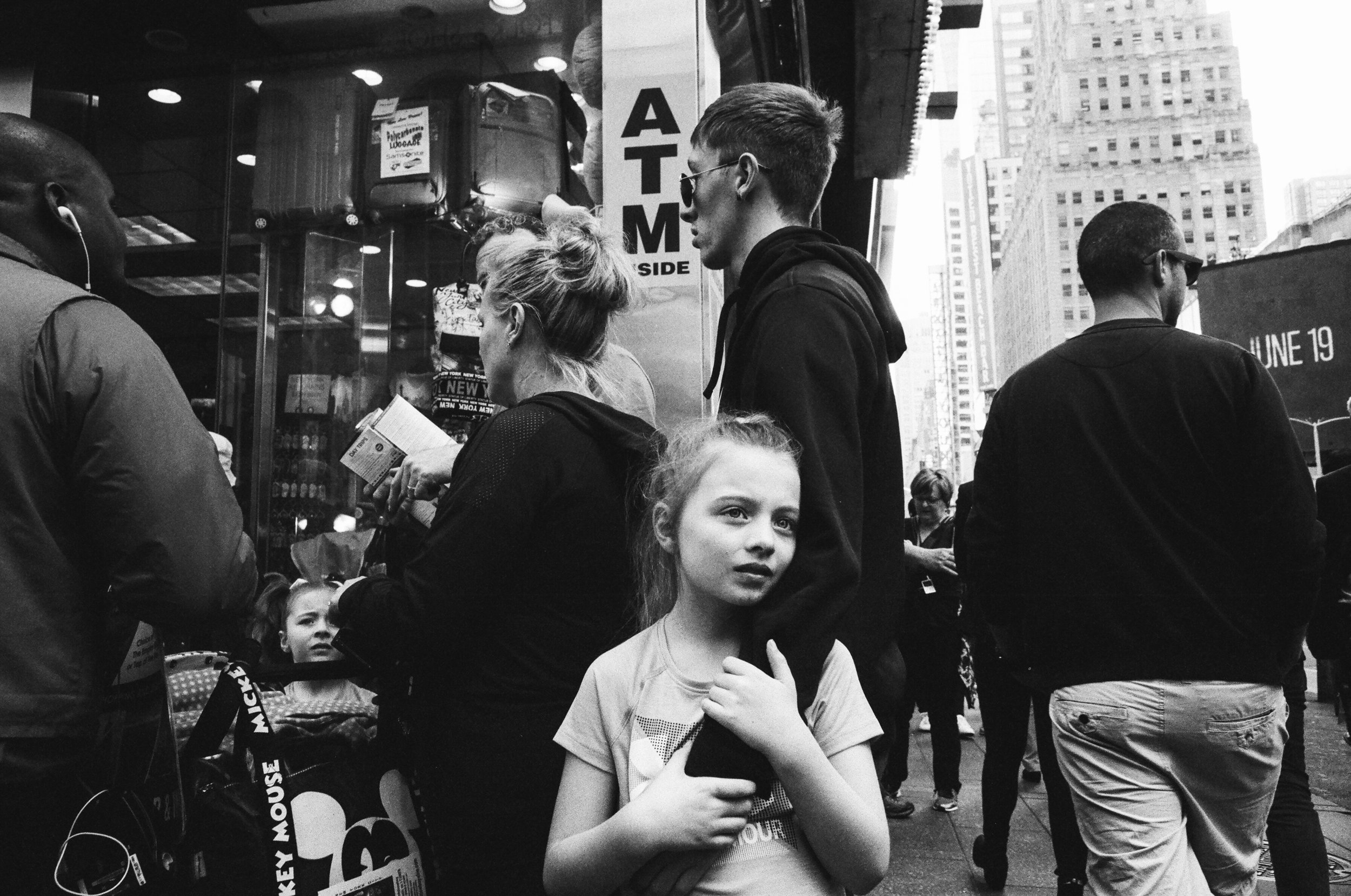 “Child gazing towards the lights of time square”&nbsp;by Joe Greer