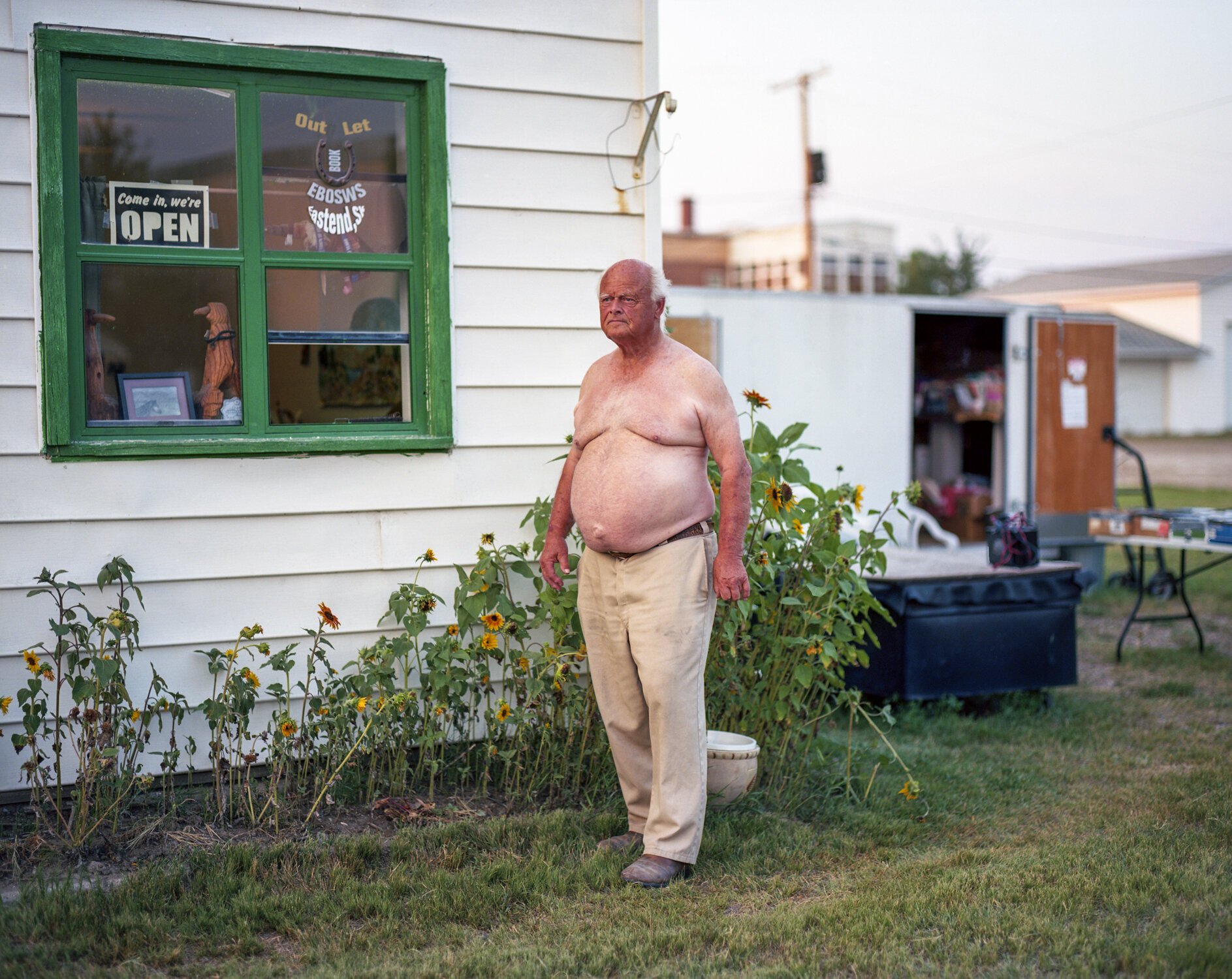 “Book salesman, Eastend, SK, 2015” by Kyler Zeleny | Pentax 67, Koda Ektar 100 Film