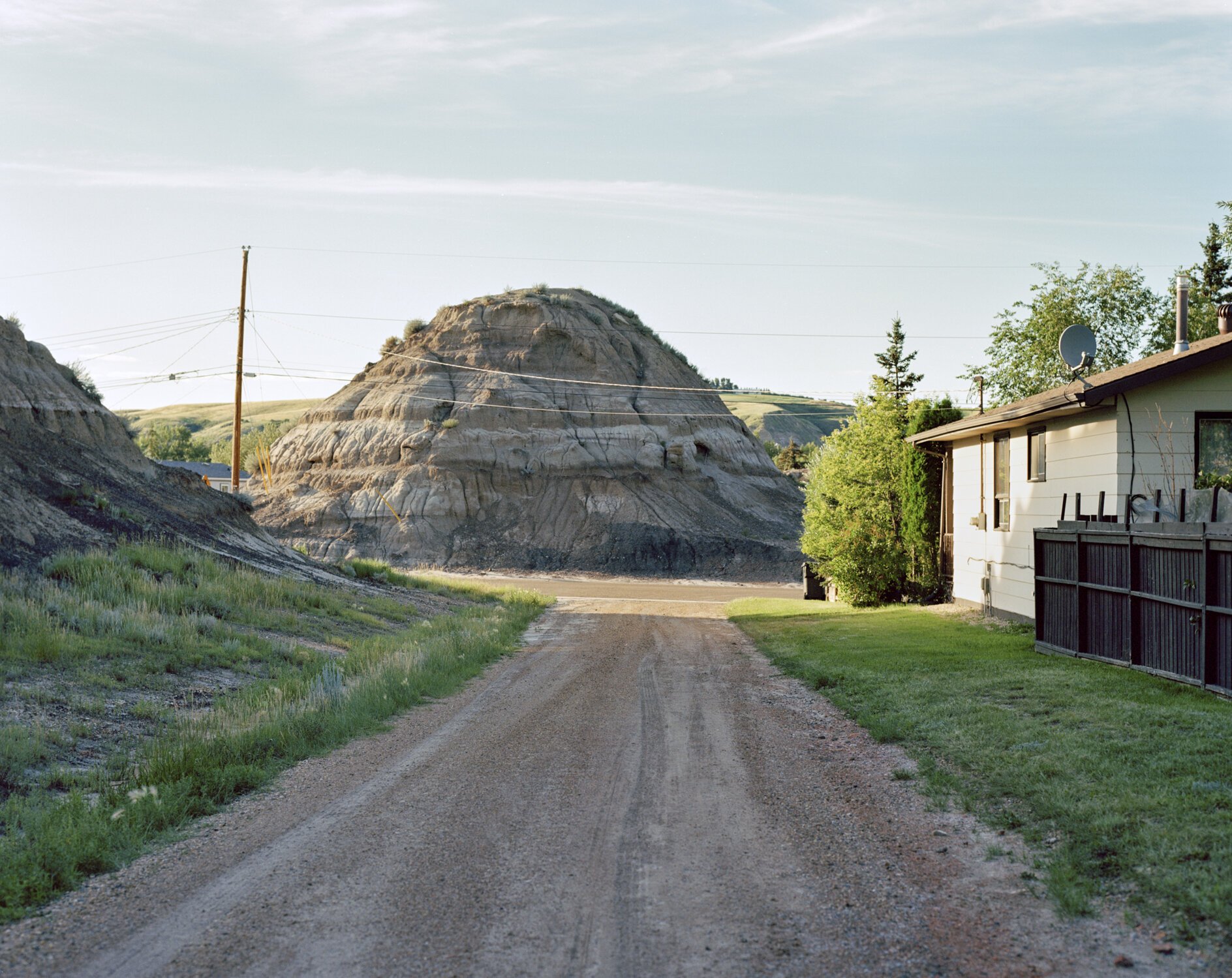 “Prairie badlands in the evening, Drumheller, AB, 2016” by Kyler Zeleny | Pentax 67, Koda Ektar 100 Film