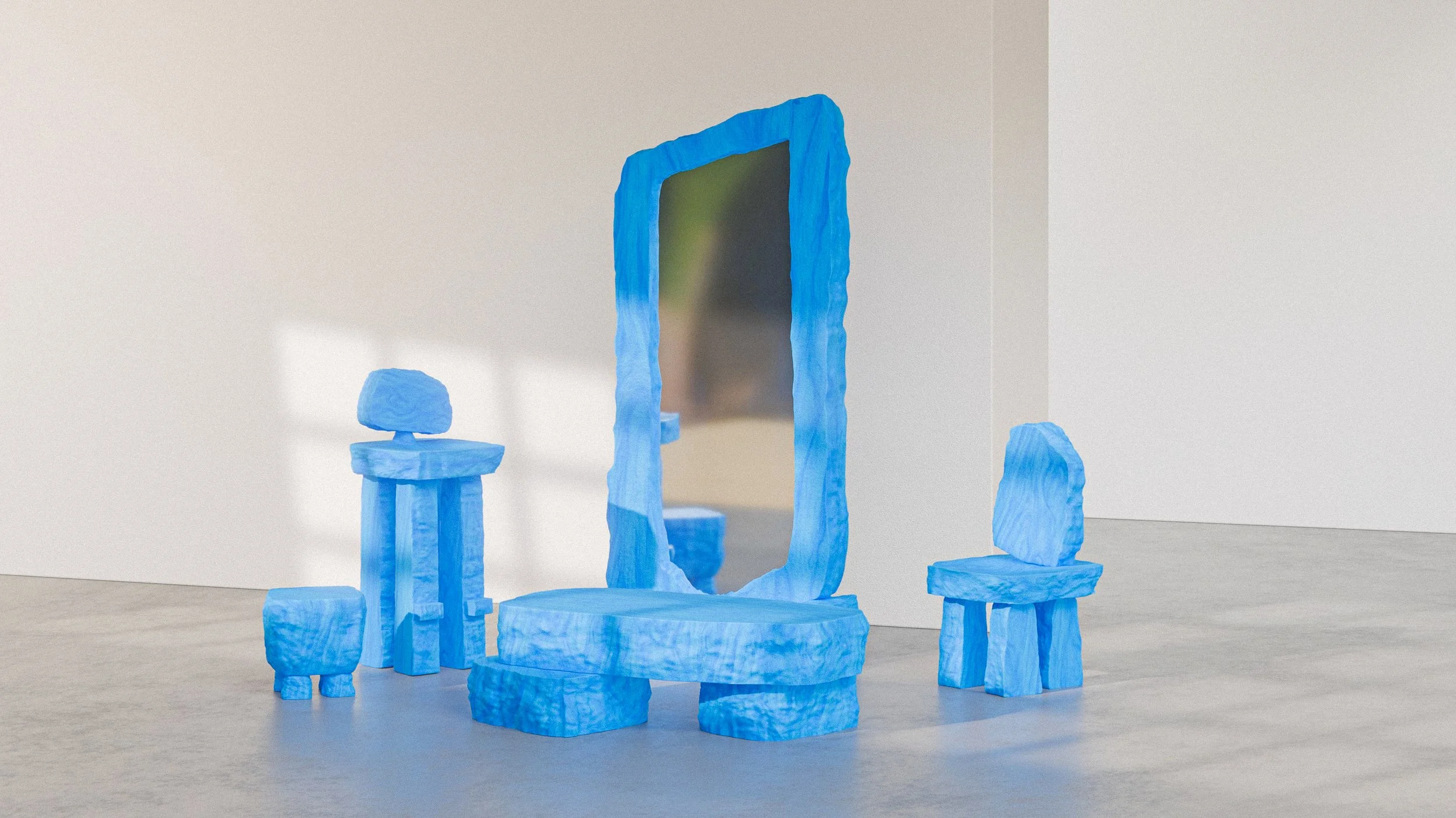 Art installation resembling the sunrise at Stonehenge, with blue, textured, block-like sculptures arranged to mimic stone formations, including a large rectangular sculpture in the background