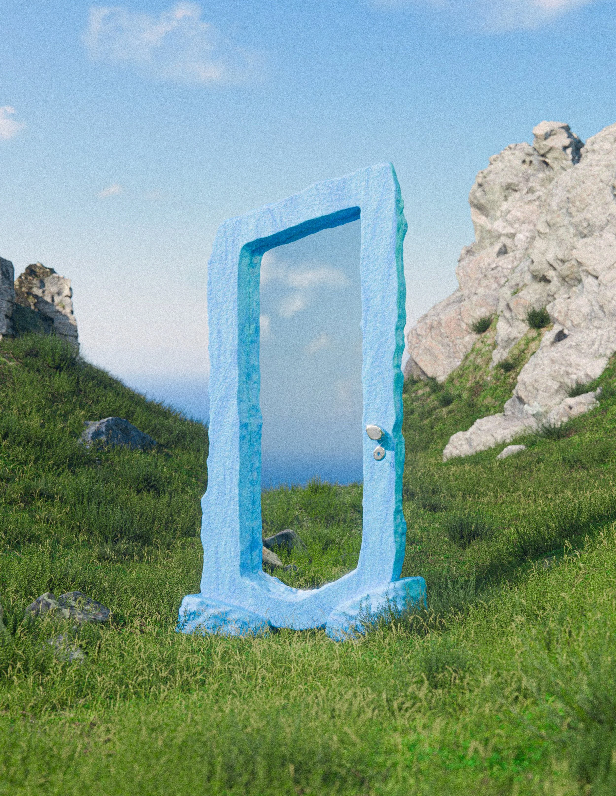 A large mirror framed by a blue, ice-like structure standing in a green grass field with rocky hills and a blue sky in the background.