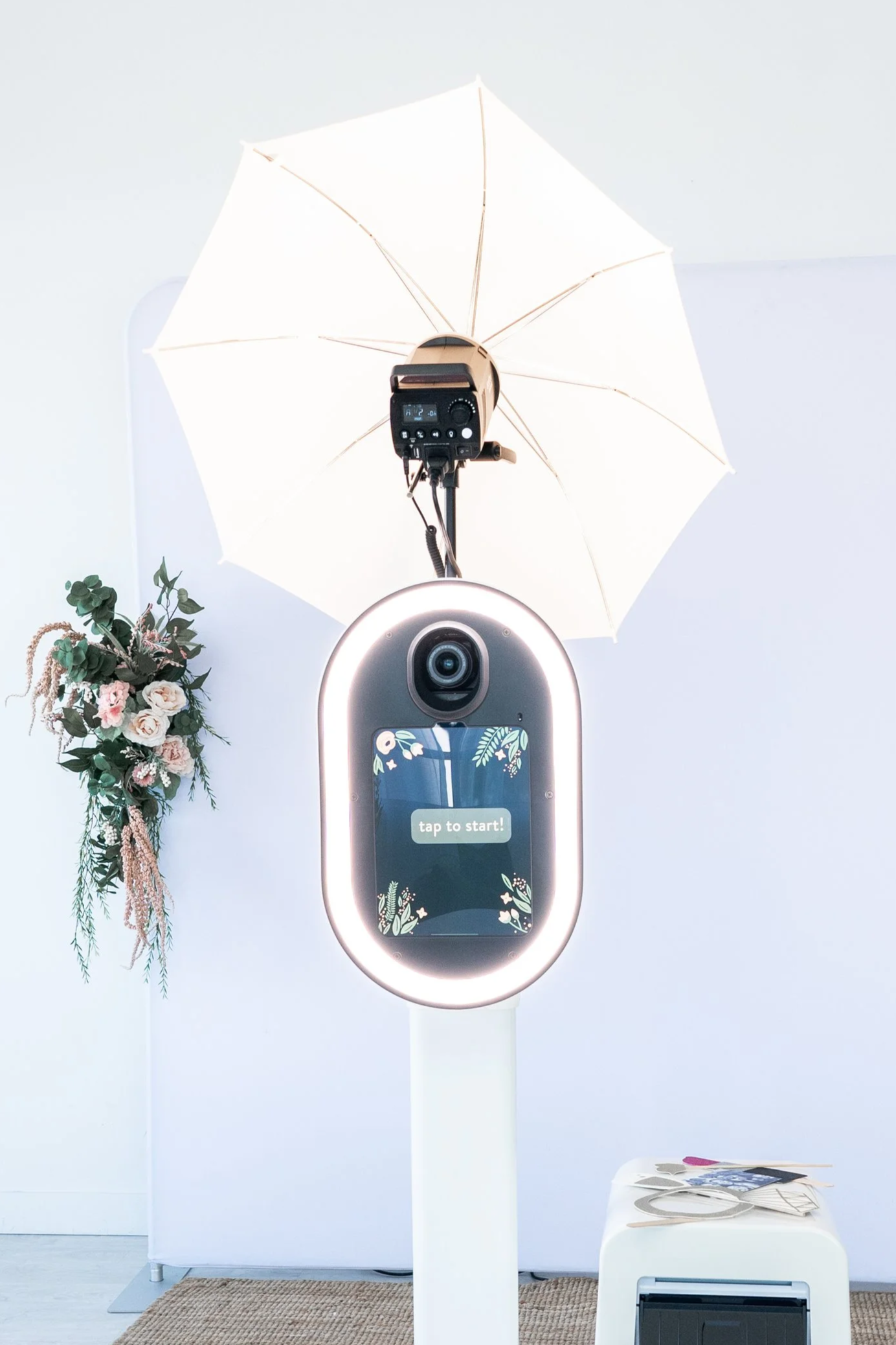 a professional photo booth set-up at a party
