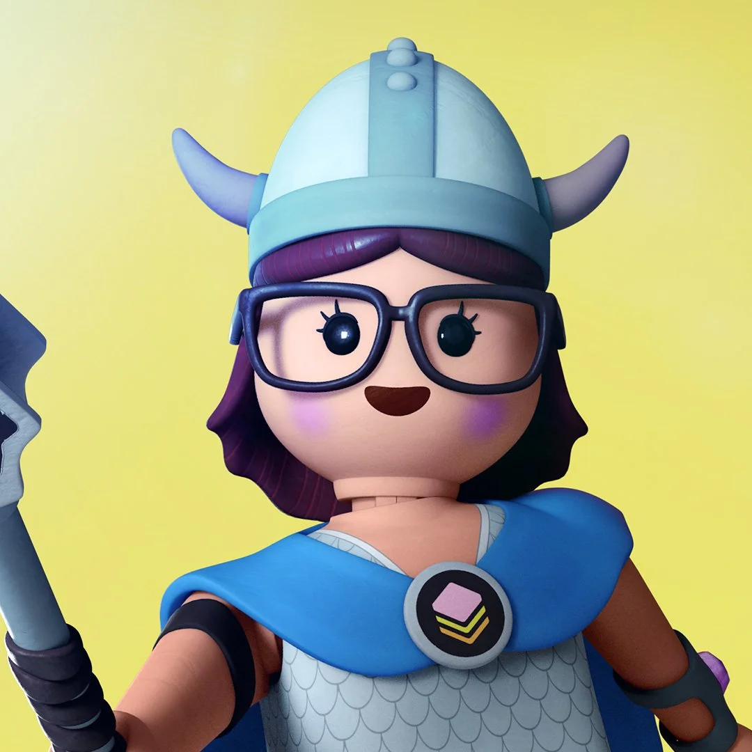 a lego-like female toy character in a viking costume on a pink background holding up a stick with a glowing blue light on the end. She is standing on a wooden block with yellow letters on it