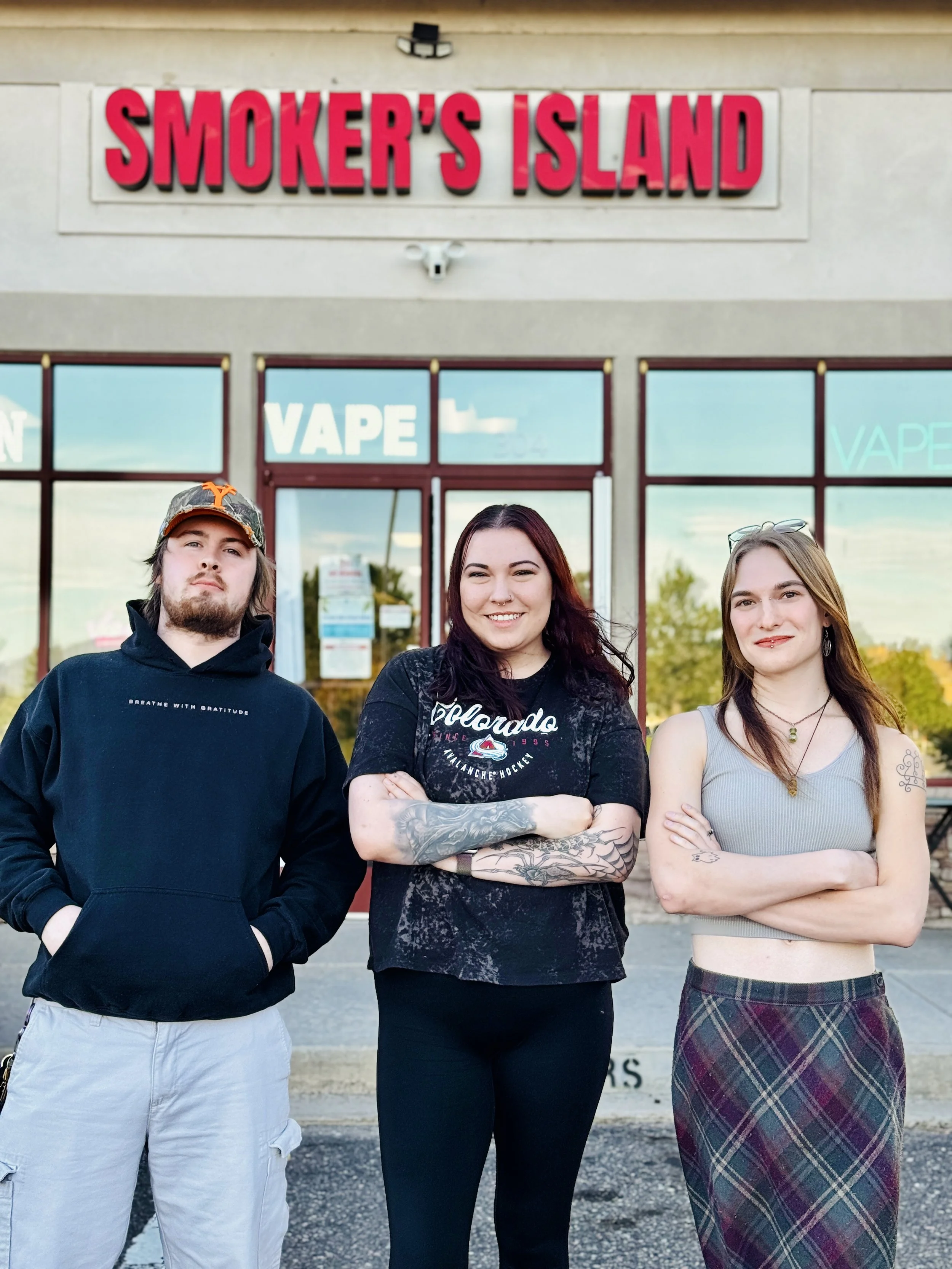 Smoker's Island vape shop staff in Englewood, CO - friendly team ready to help with vapes, kratom, accessories.