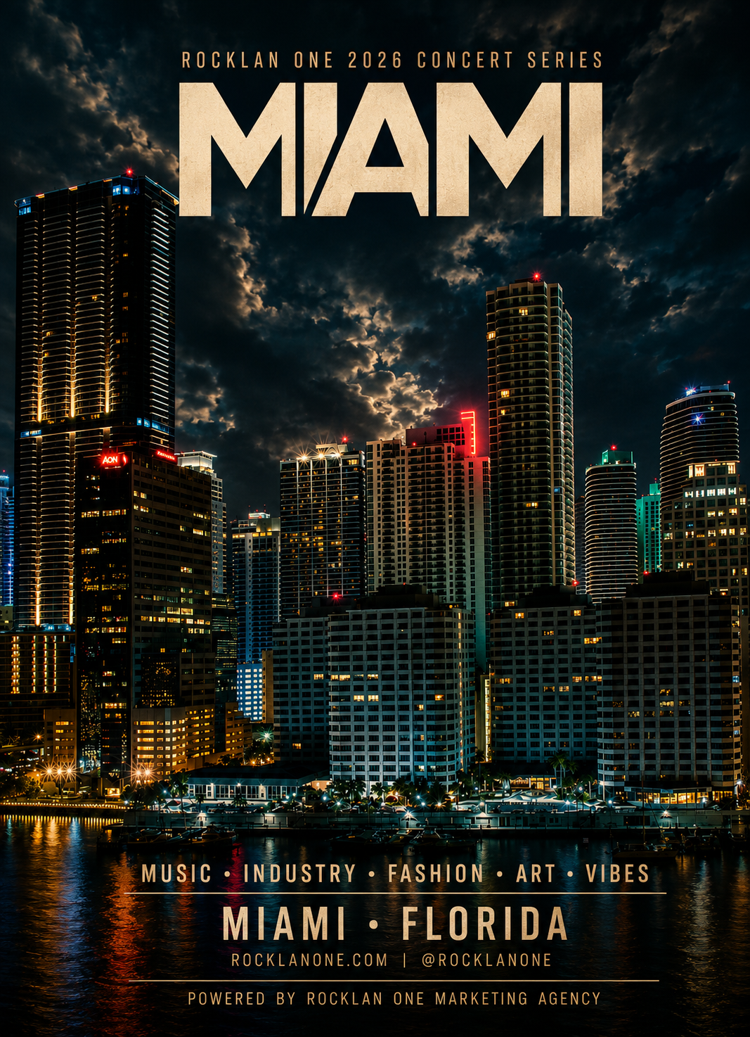 Nighttime view of Miami skyline with tall buildings illuminated, reflections on water, promoting Miami Collision Course Concert Series during Art Basel 2026 weekend.