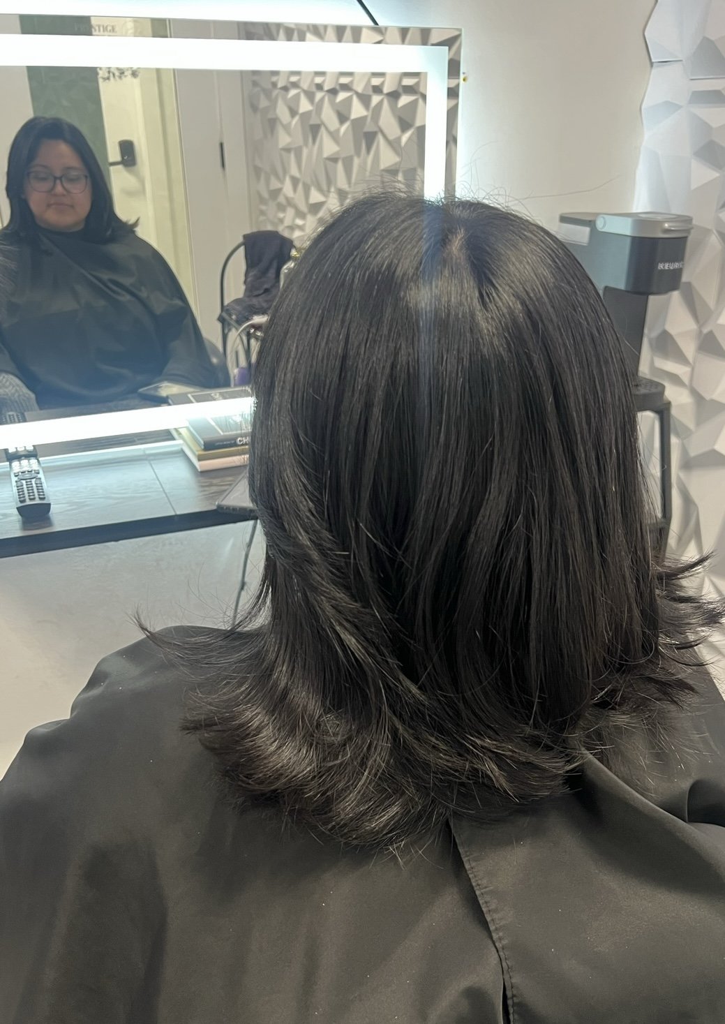 AFTER- collared bone length haircut for easy styling and still long enough for a ponytail.