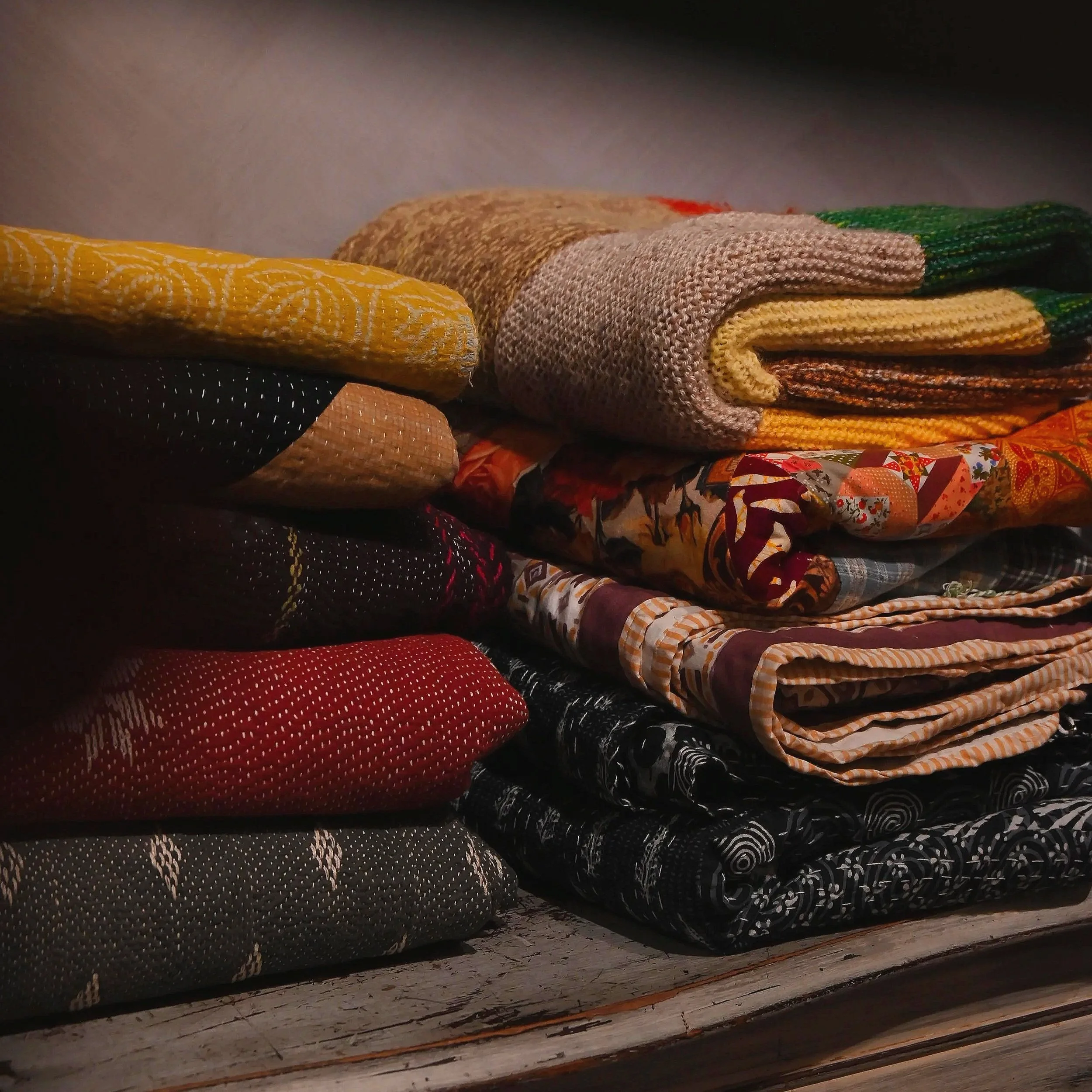 Woven clothing, handmade bags and textile pieces