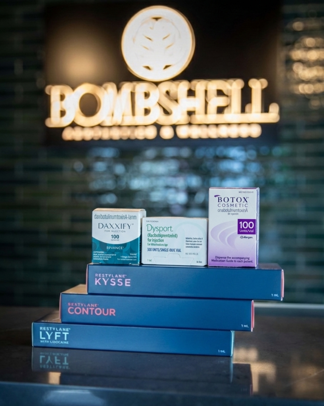 Botox, Dysport, Daxxify, and Restylane fillers displayed at Bombshell Aesthetics in Bedford, NH, showcasing injectable aesthetic treatments.