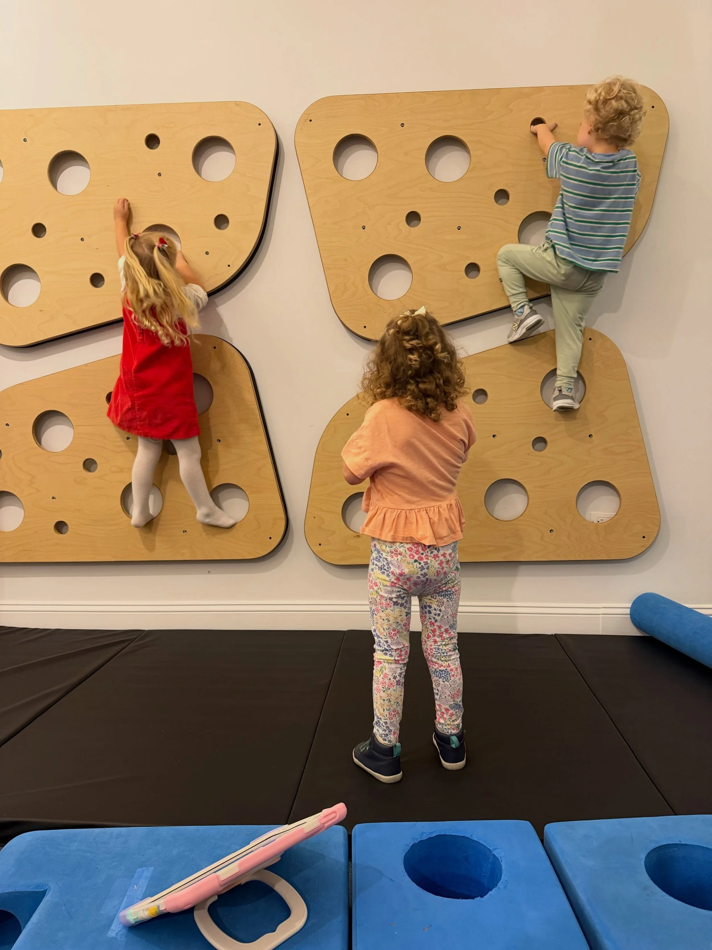 Up, up, and away! Our Room 7 friends have been exploring new heights, testing their abilities, and discovering the many ways their bodies can move! As children navigate the climbing wall, they engage in thoughtful problem-solving: Where should my foo