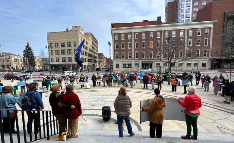 Environmental activists gather in Portland on Earth Day to call for an end to the fossil fuel era